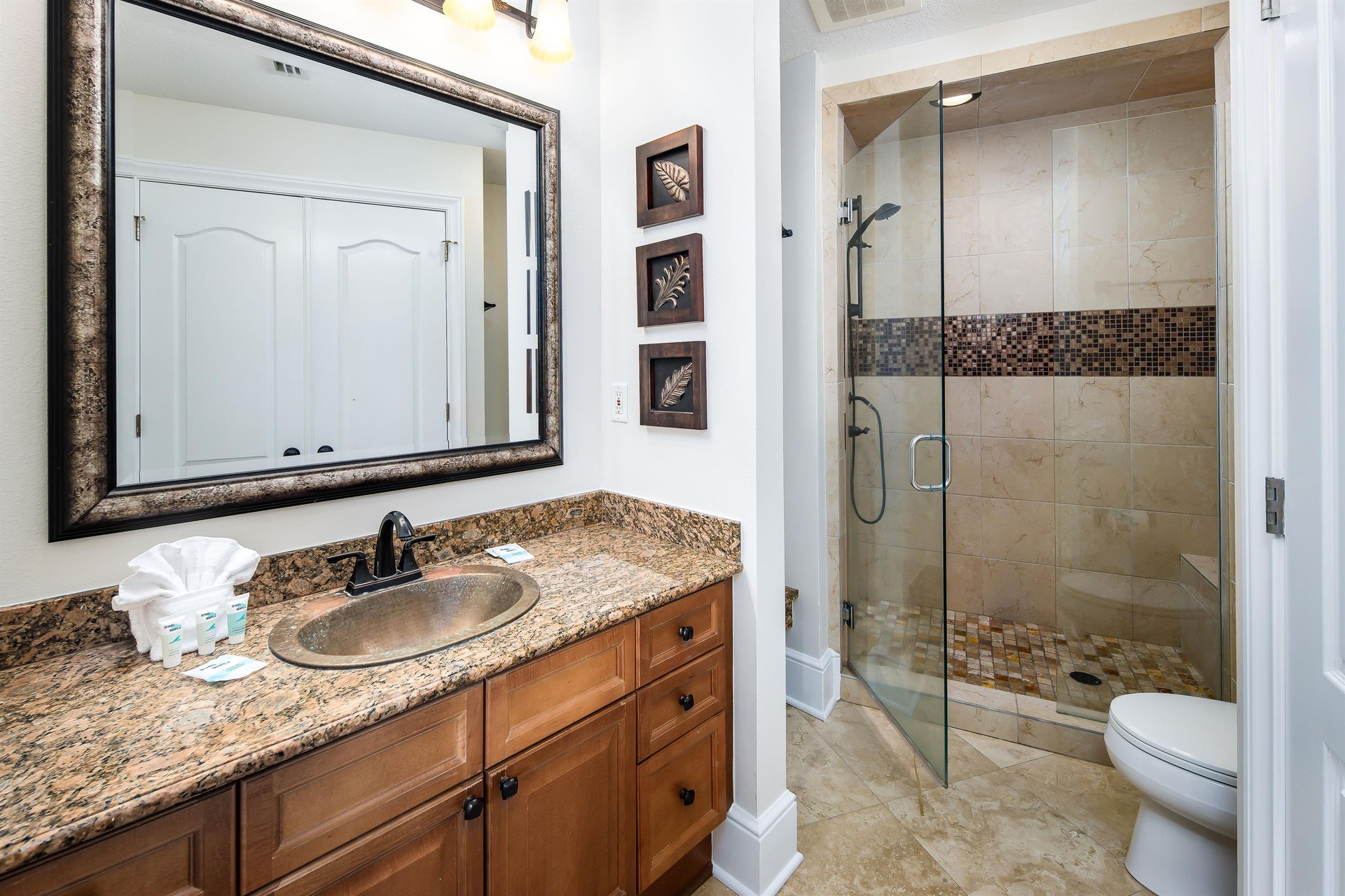 An alluring bathroom with a walkin shower.