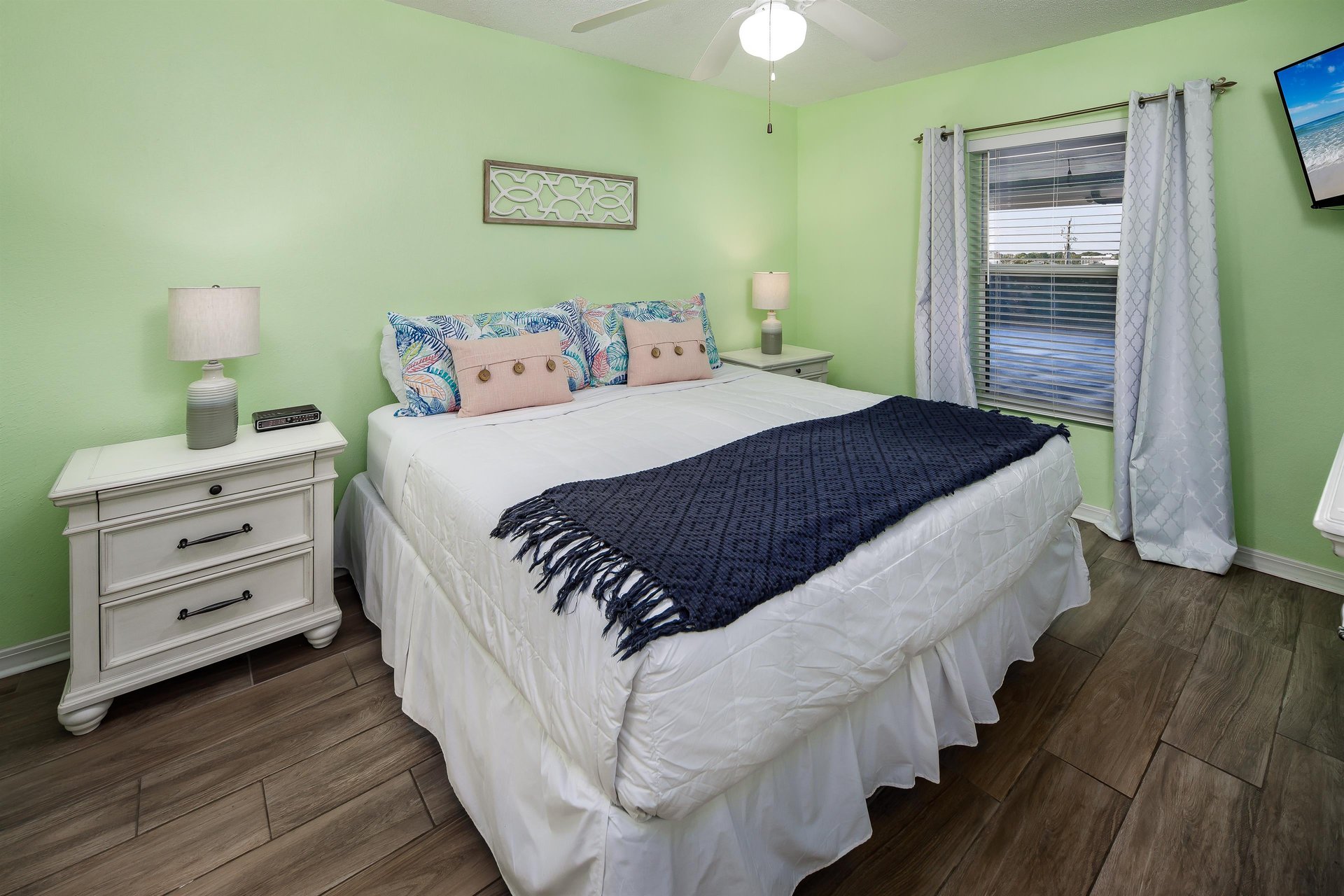 Featuring a comfy king size bed, this master bedroom will be the perfect spot for resting after a fun and tiring day on the beach.