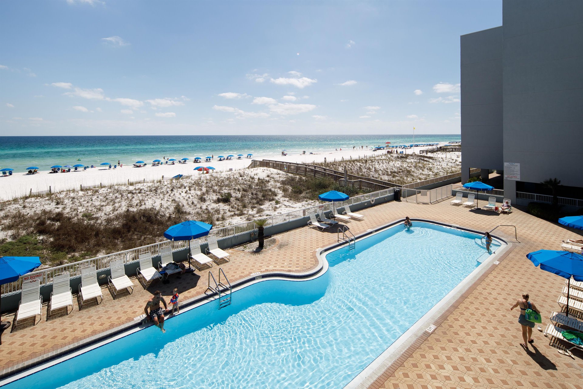 rom the balcony of this unit, you can see the 80 swimming pool. The pool deck area holds ample space for basking in the warm Florida sun.