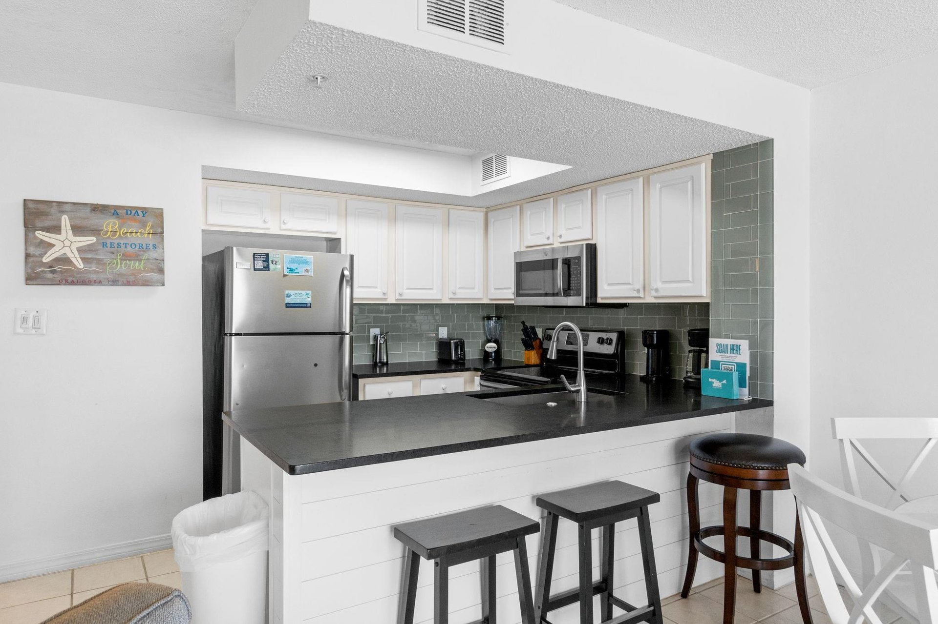 With additional seating at the kitchen island.