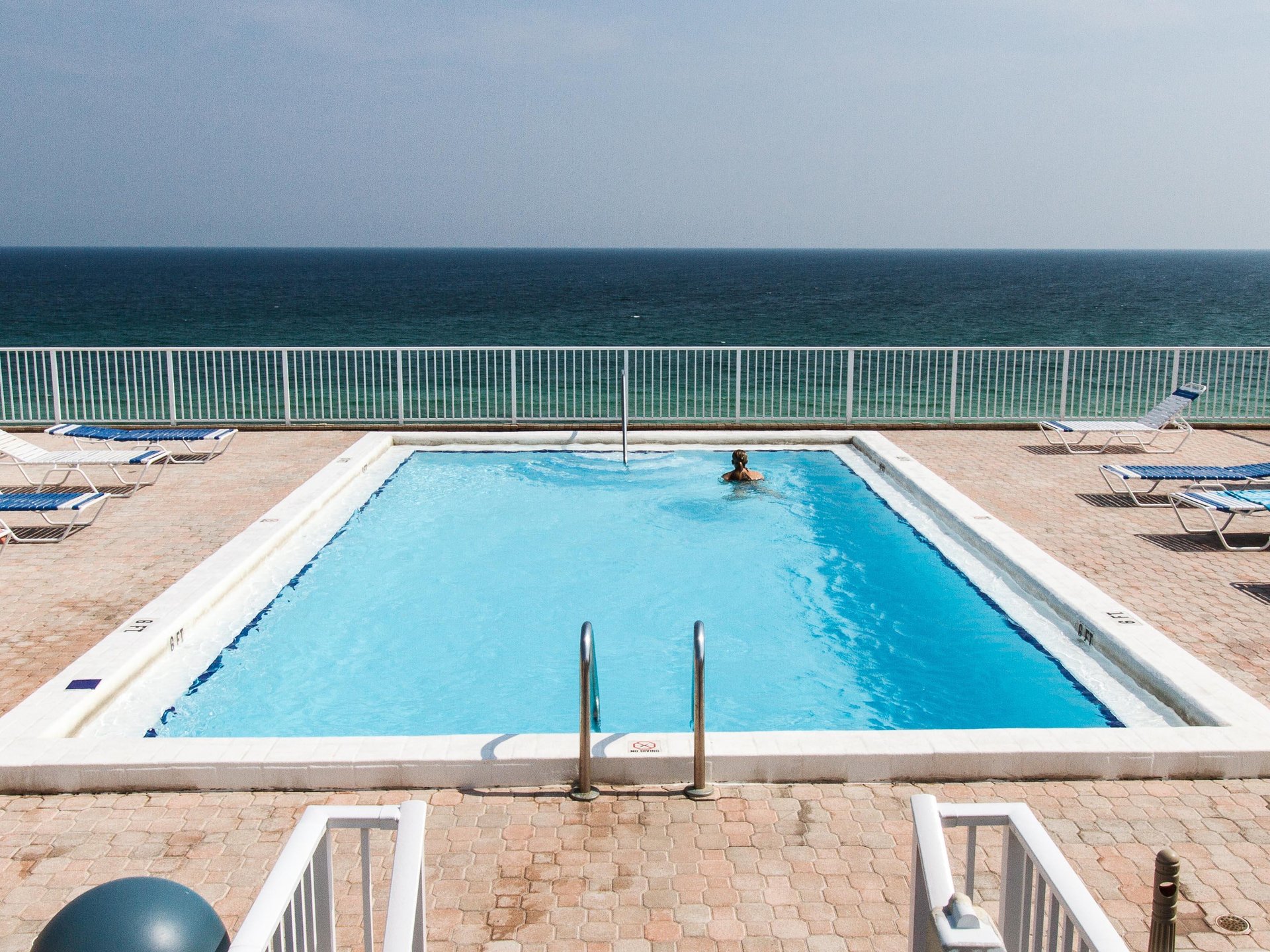 You can swim and sunbathe on top of Gulfside Condominiums WITHOUT the sand