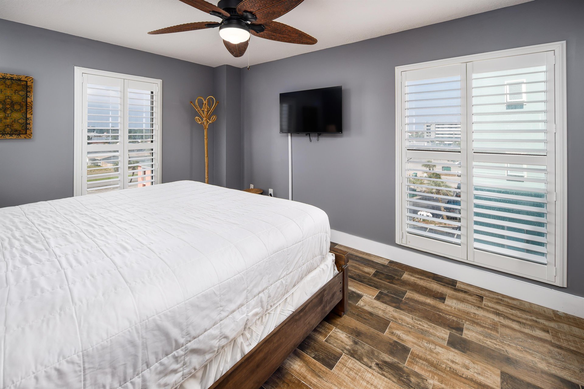 Features beautiful flooring and a mounted TV for your viewing pleasure