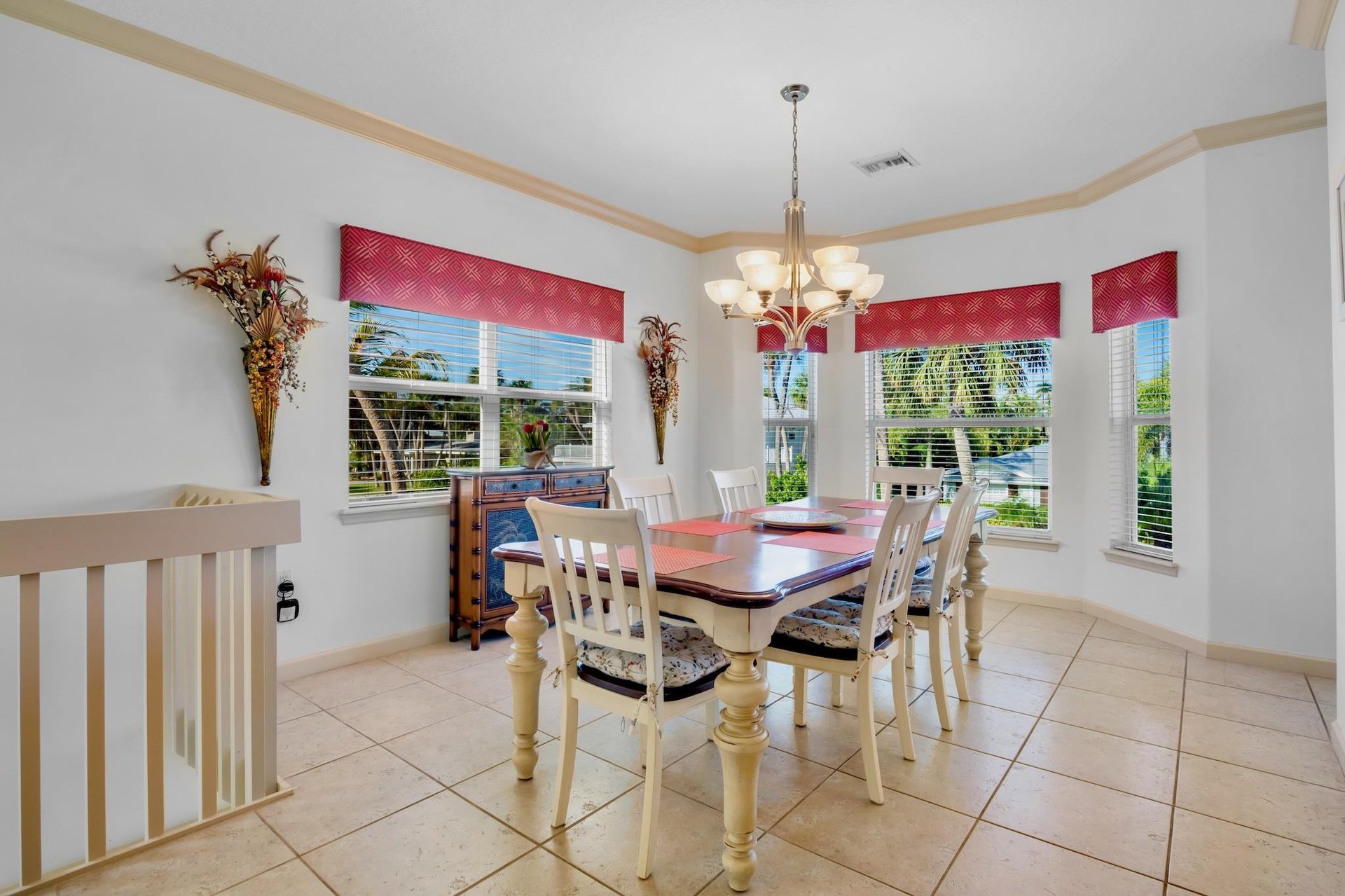 Gather around this elegant dining table for memorable meals with loved ones in your bright, welcoming dining space.