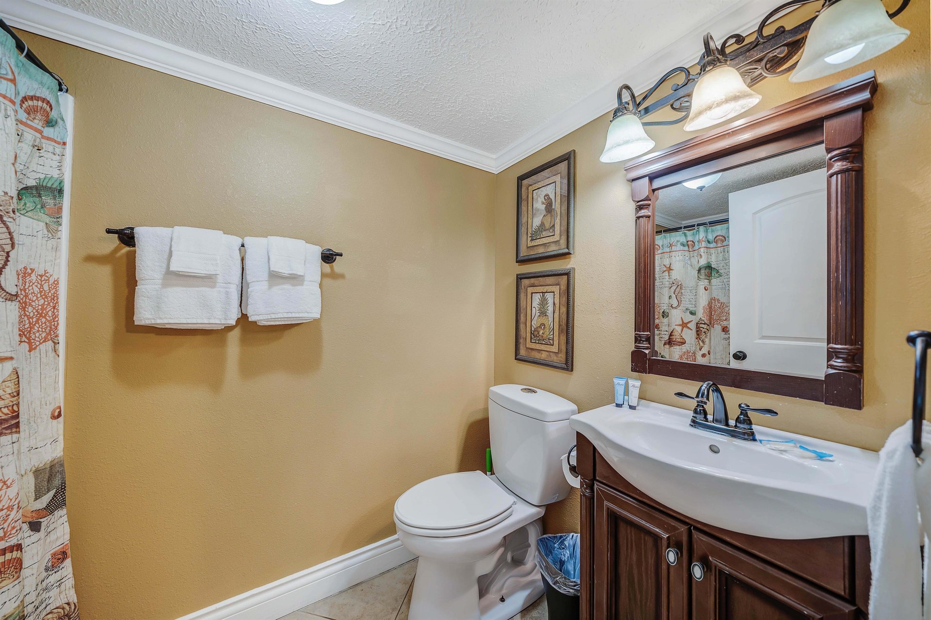Just down the hall, youll find an additional full bathroom with tubshower combo, perfect for pullout sofa guests or if you just need a little more room to spread out.