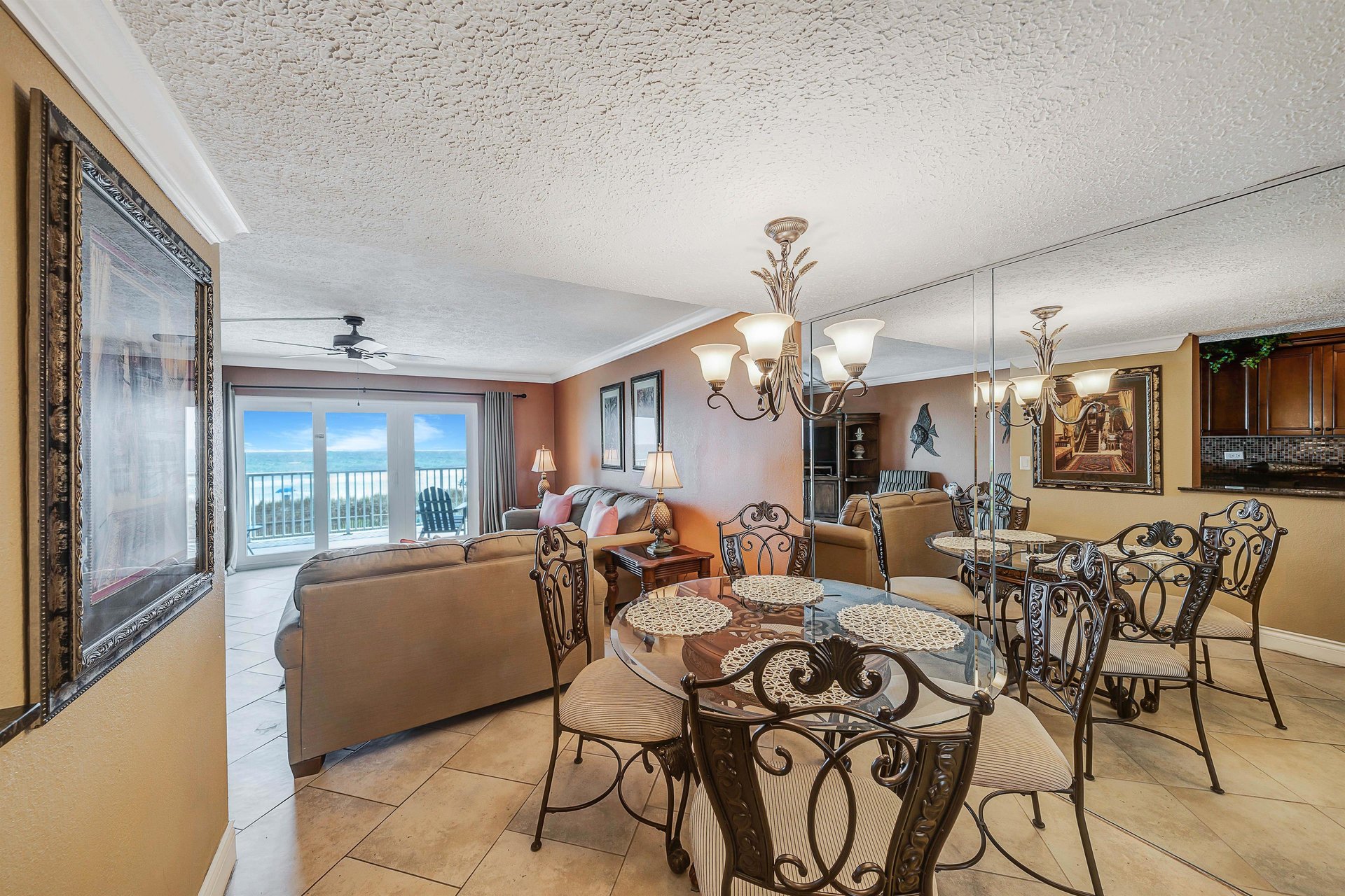 There is a dining table that seats 4, as well as additional breakfast bar seating.