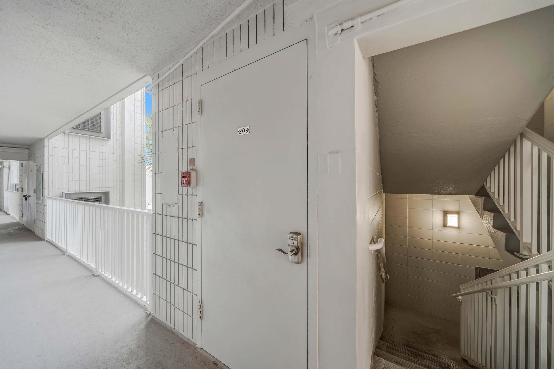 Directly across from the units front door is a separate laundry room. This laundry room is for your units use only and is secured with a door code.
