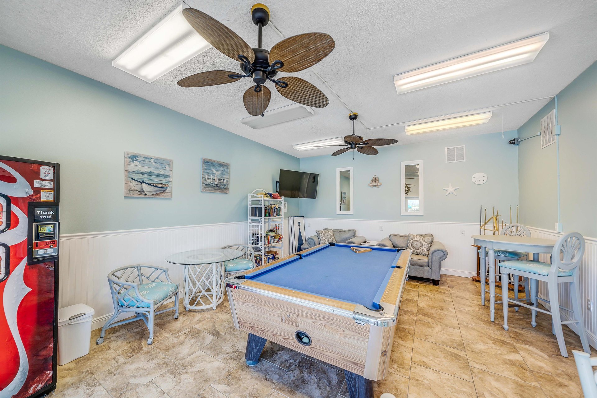 Take a break from the sun and play a game of pool in the game room.