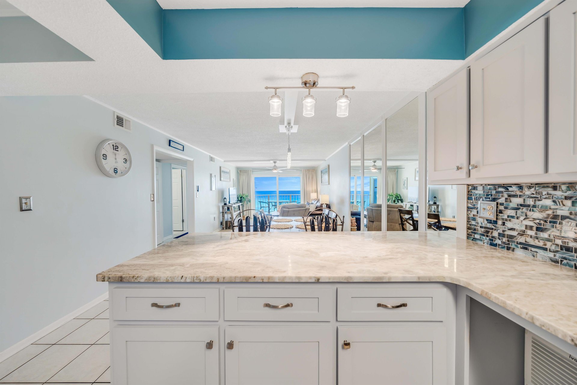 The updated, fully equipped kitchen features quartz countertops, stainlesssteel appliances, and has everything you need to prepare meals for family  friends.
