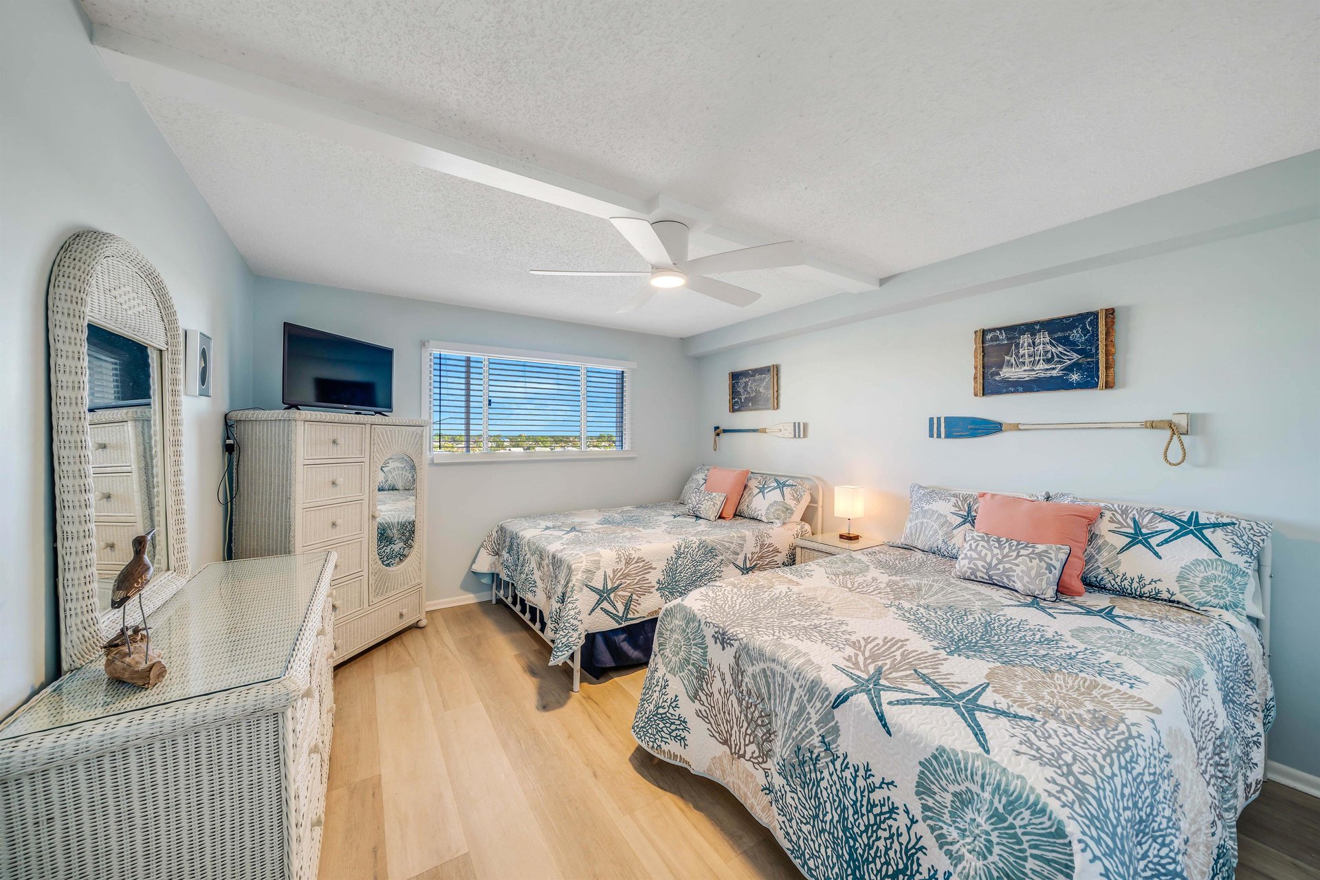 The front bedroom features both a Queen and a fullsized bed and its own television.