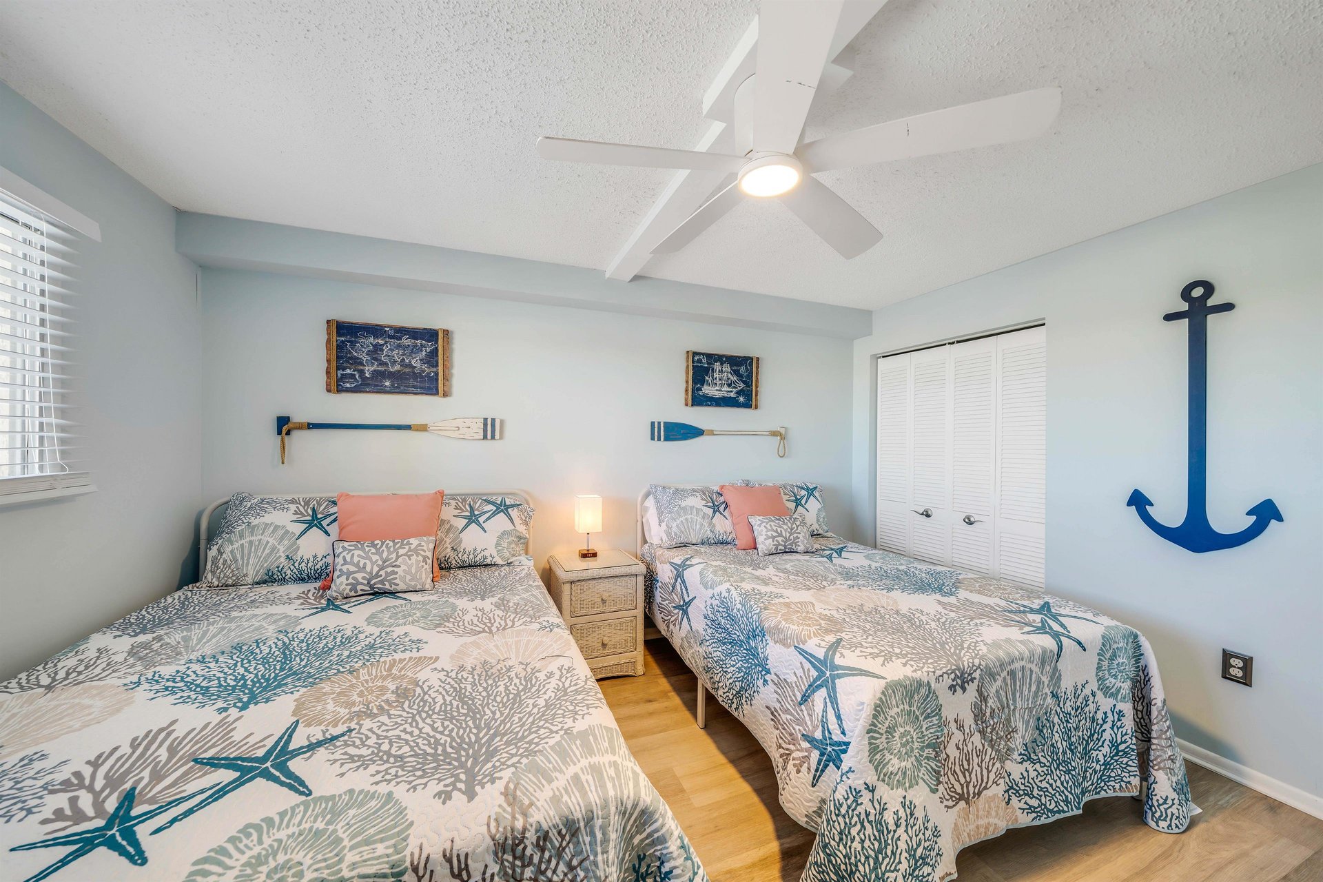 The front bedroom features both a Queen and a fullsized bed and its own television.