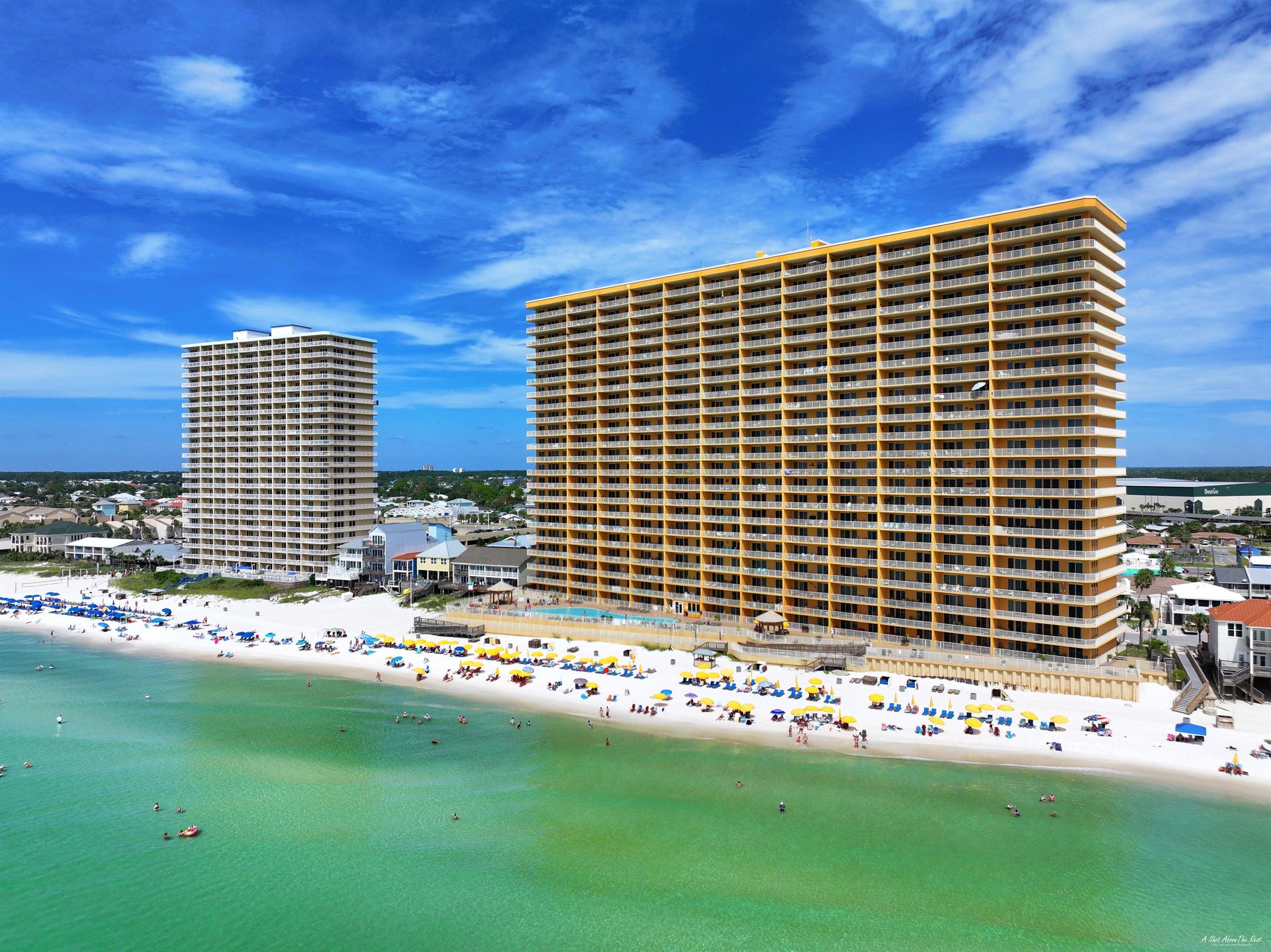 Treasure Island Resort offers guests a large, resort style gulf front swimming pool heated seasonally, hot tub, poolside cafe, gas grills,  fitness center