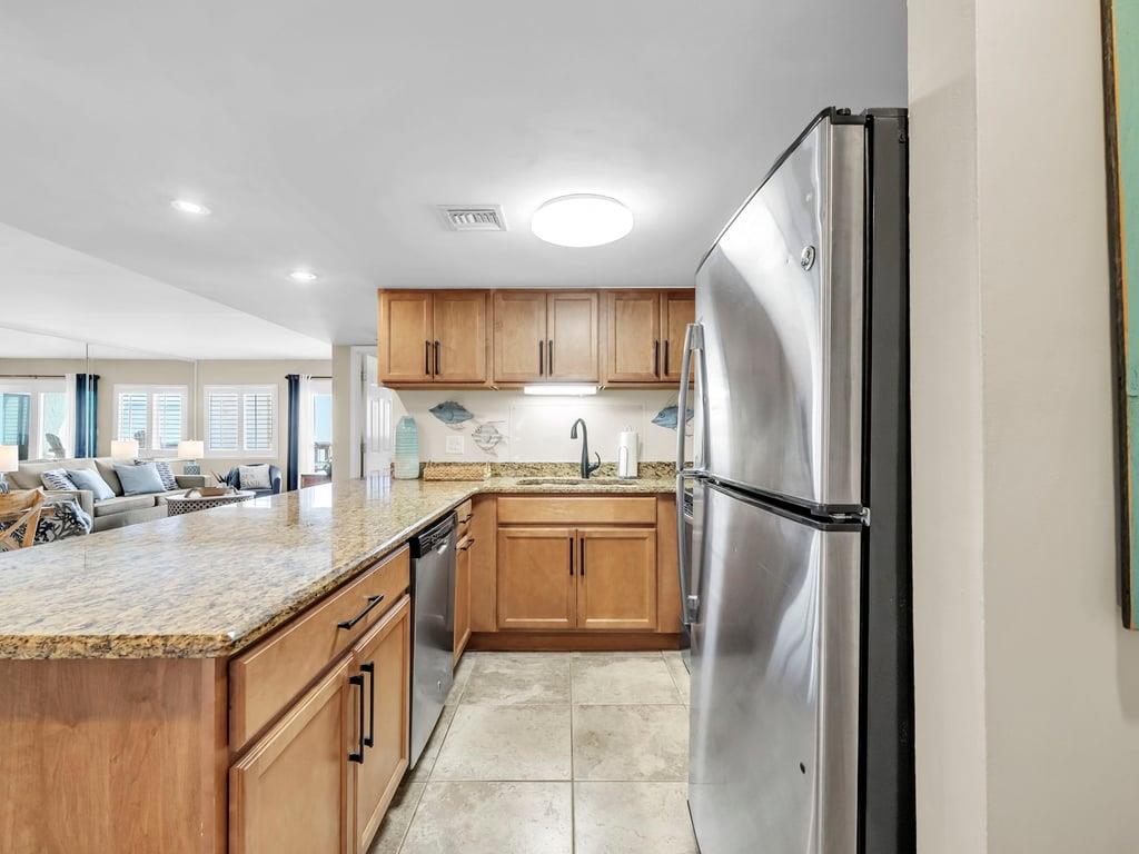 Unit Entrance into Fully Stocked Kitchen