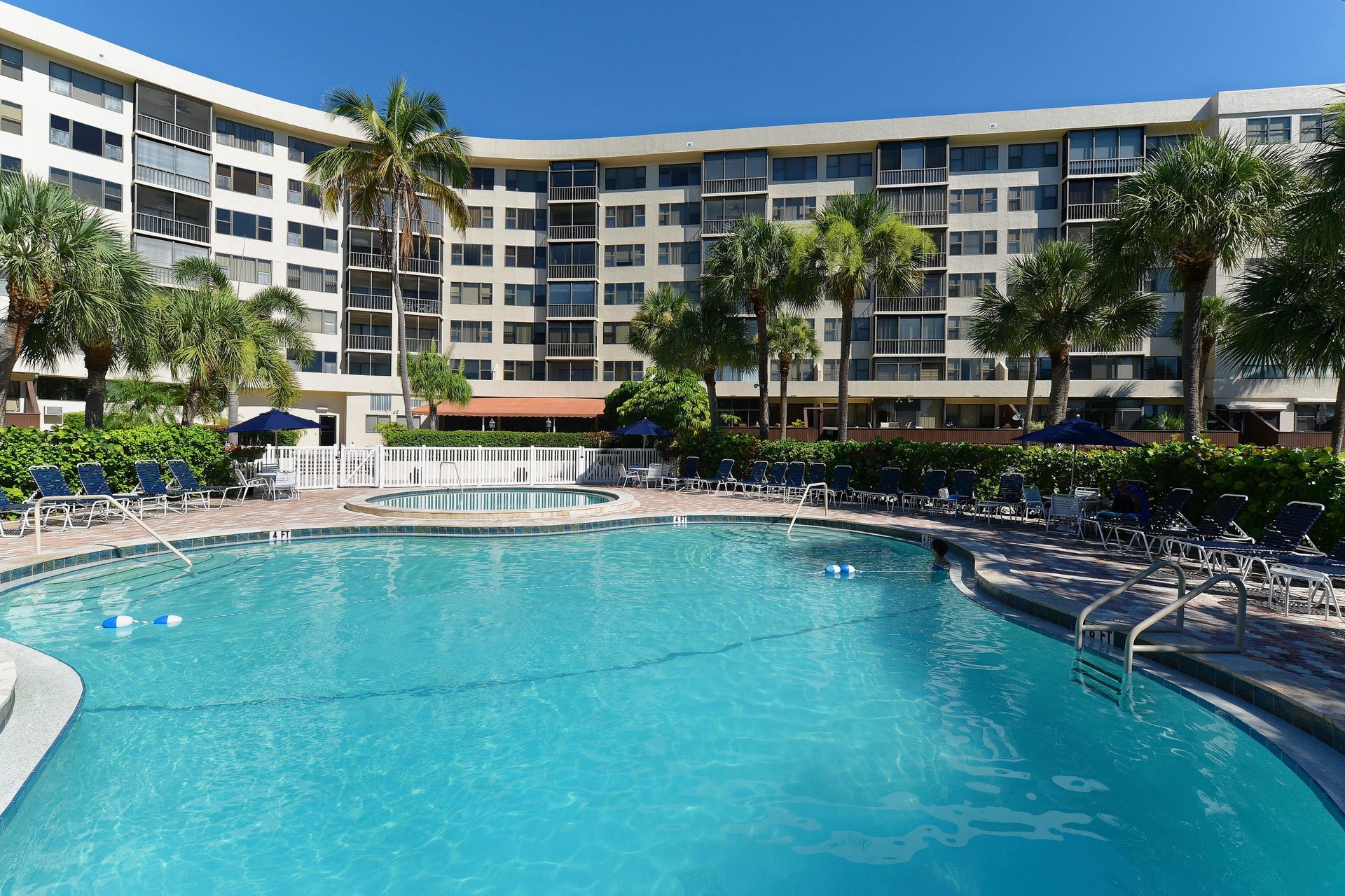 Take a refreshing dip in the crystalclear pool surrounded by swaying palms and comfortable loungers for your ultimate relaxation.