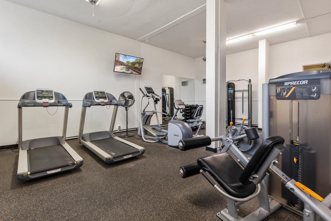 Stay active during your getaway in this wellequipped fitness center featuring treadmills, ellipticals, and strength training equipment for your daily workout routine.