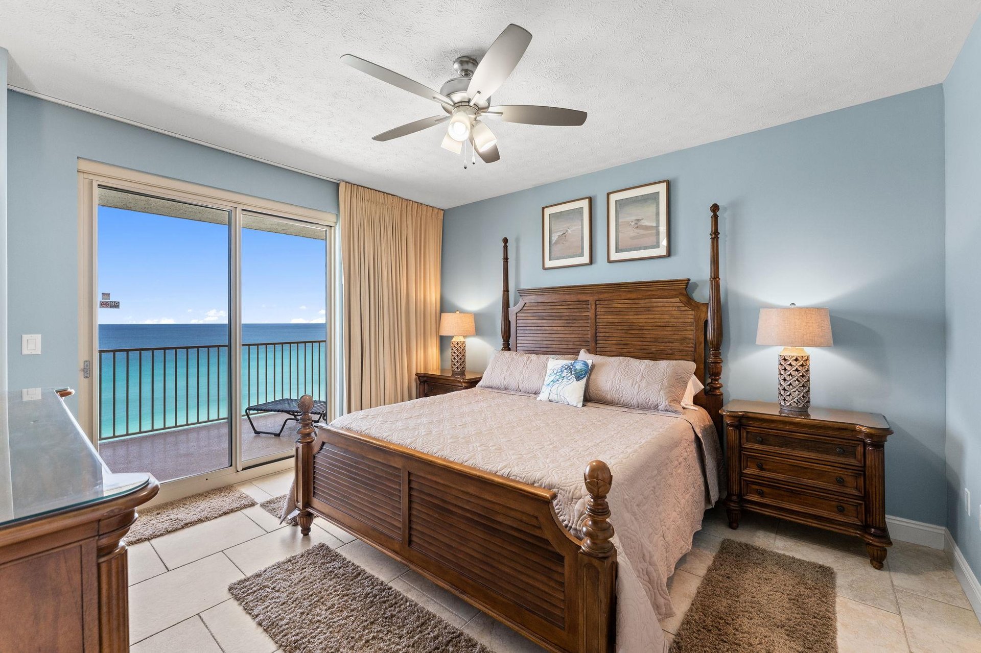 The gulf front master bedroom offers a Kingsized bed, a television, access to the balcony, and it own ensuite bathroom.
