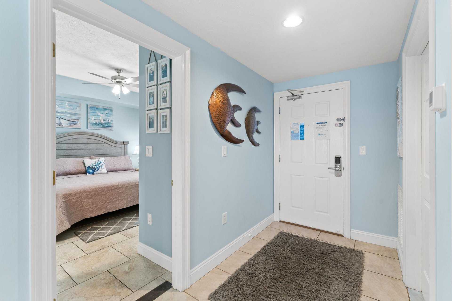 The front bedroom offers another Kingsized bed, a television, and direct access to the second bathroom.