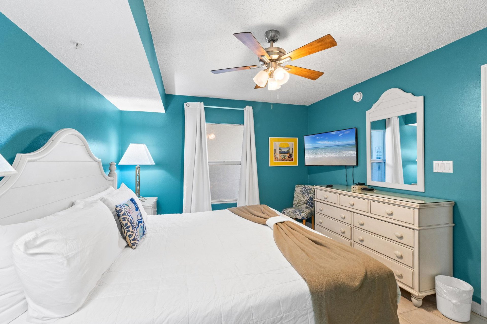 With a flat screen television and access to the bathroom