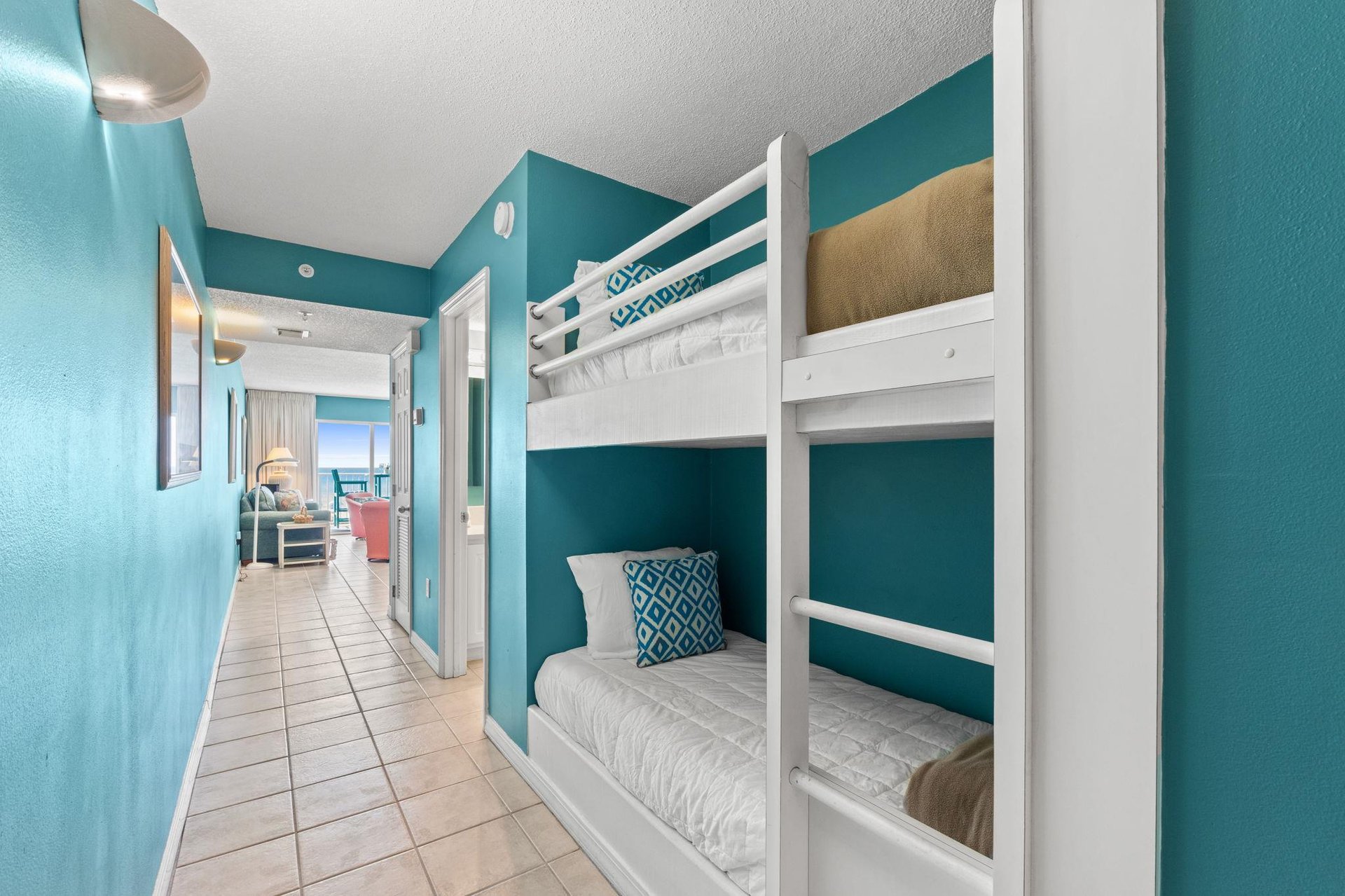 nestled into the wall these bunks provide additional sleeping for 2  perfect for younger children