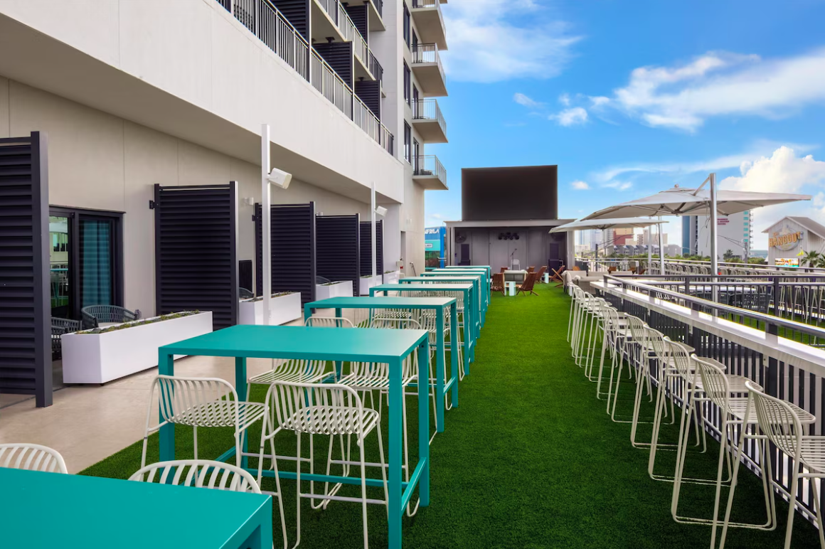 Outdoor patio at Embassy Suites By Hilton Gulf Shores Beach Resort