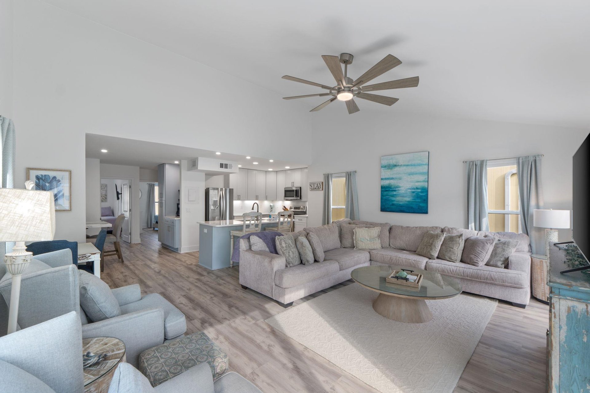 Step into your spacious openconcept living area where plush seating and modern design create the perfect retreat for relaxation and gathering.