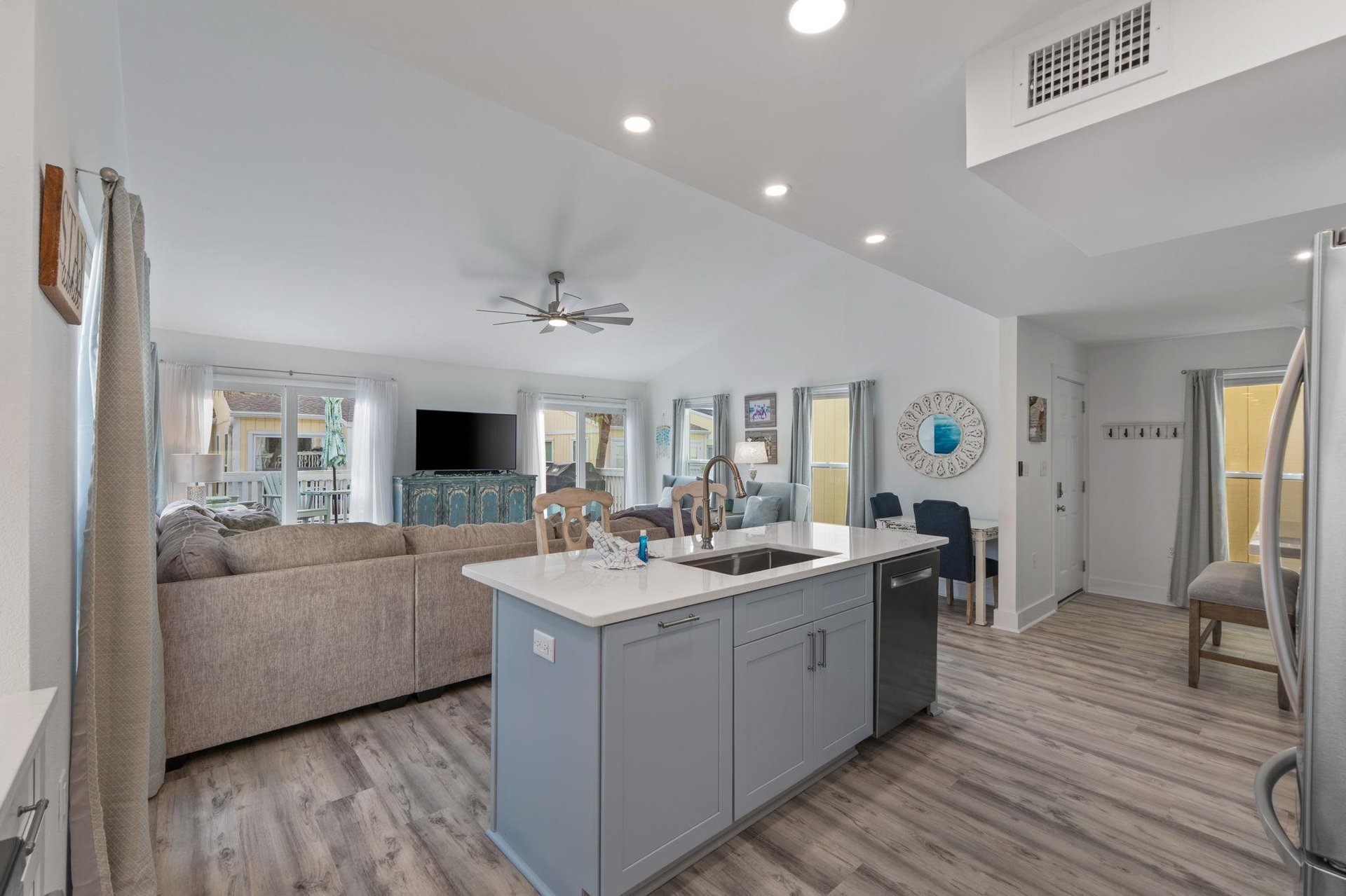 Your openconcept haven seamlessly blends kitchen, dining, and living spaces with modern finishes and natural light throughout.