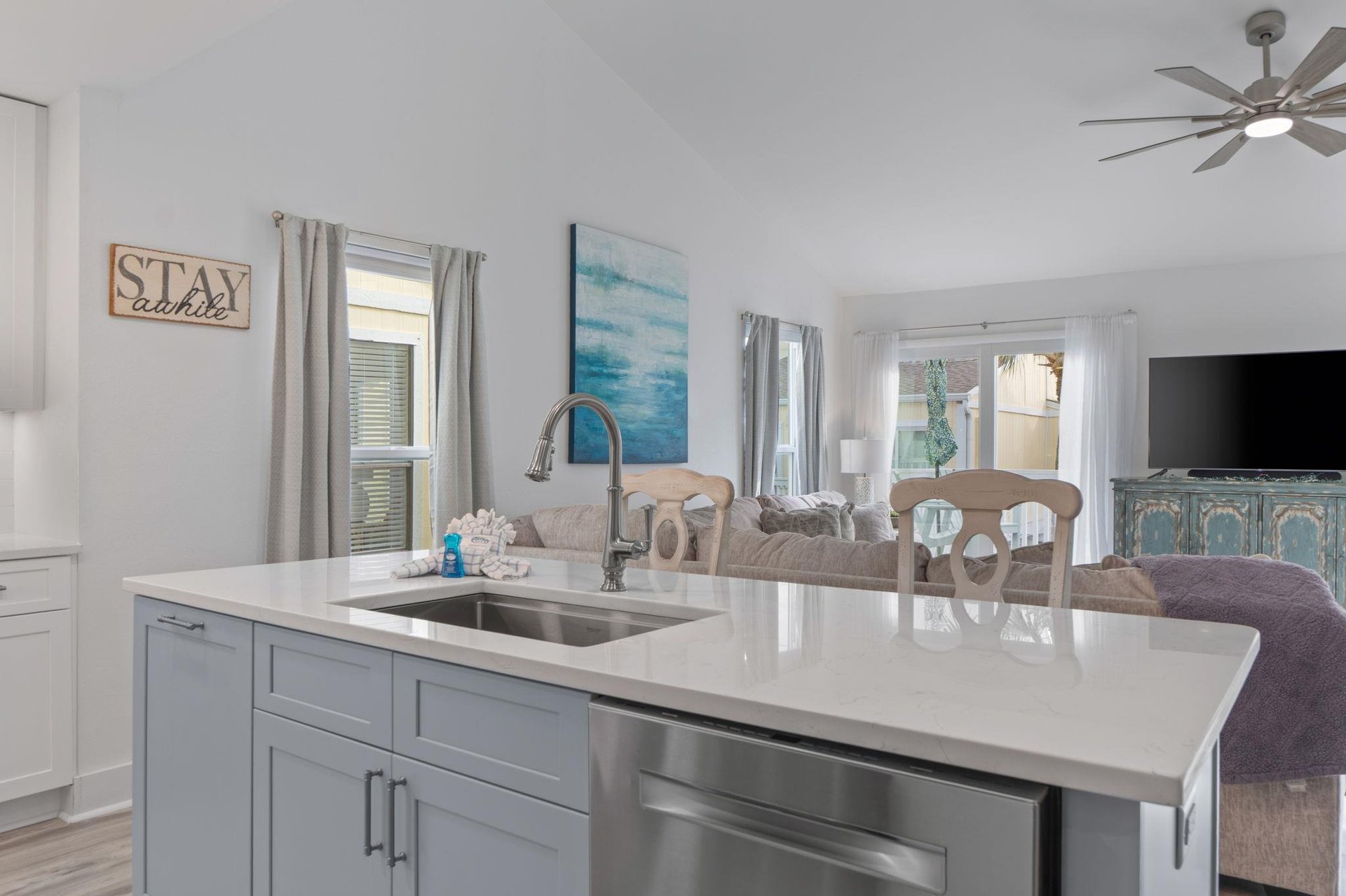 Your bright open kitchen flows into the living space, perfect for cooking while chatting with family.