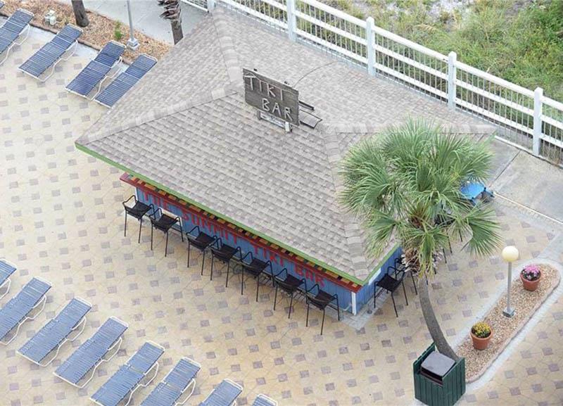 Enjoy a cool drink from the onsite tiki bar at Summit Beach Resort in Panama City Beach Florida