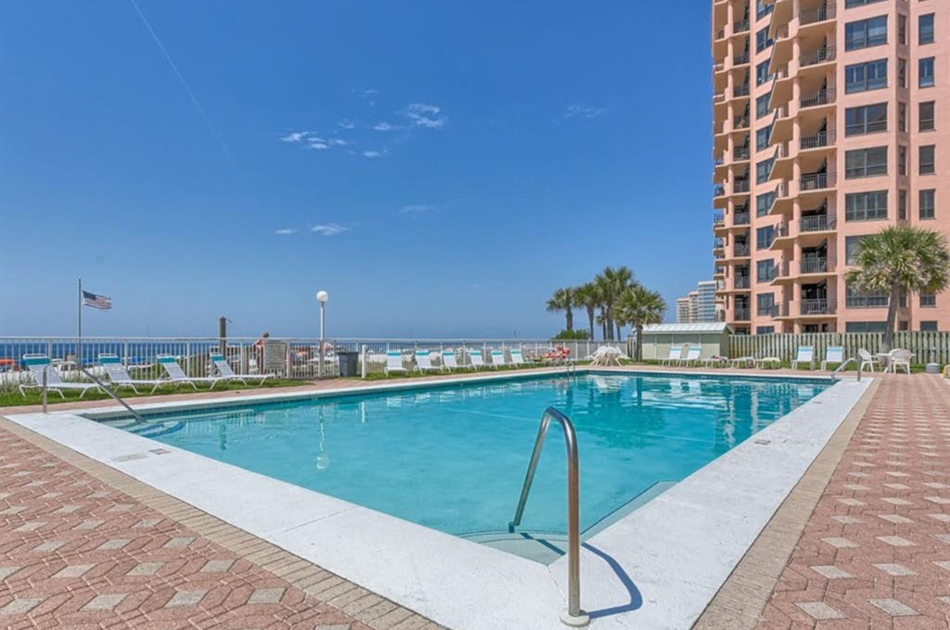 The swimming pool next to the beach at Sunswept Condominiums in Orange Beach Alabama