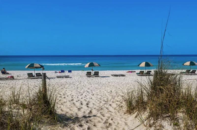 beachcomber by the sea panama city beach beachfront chair water ocean