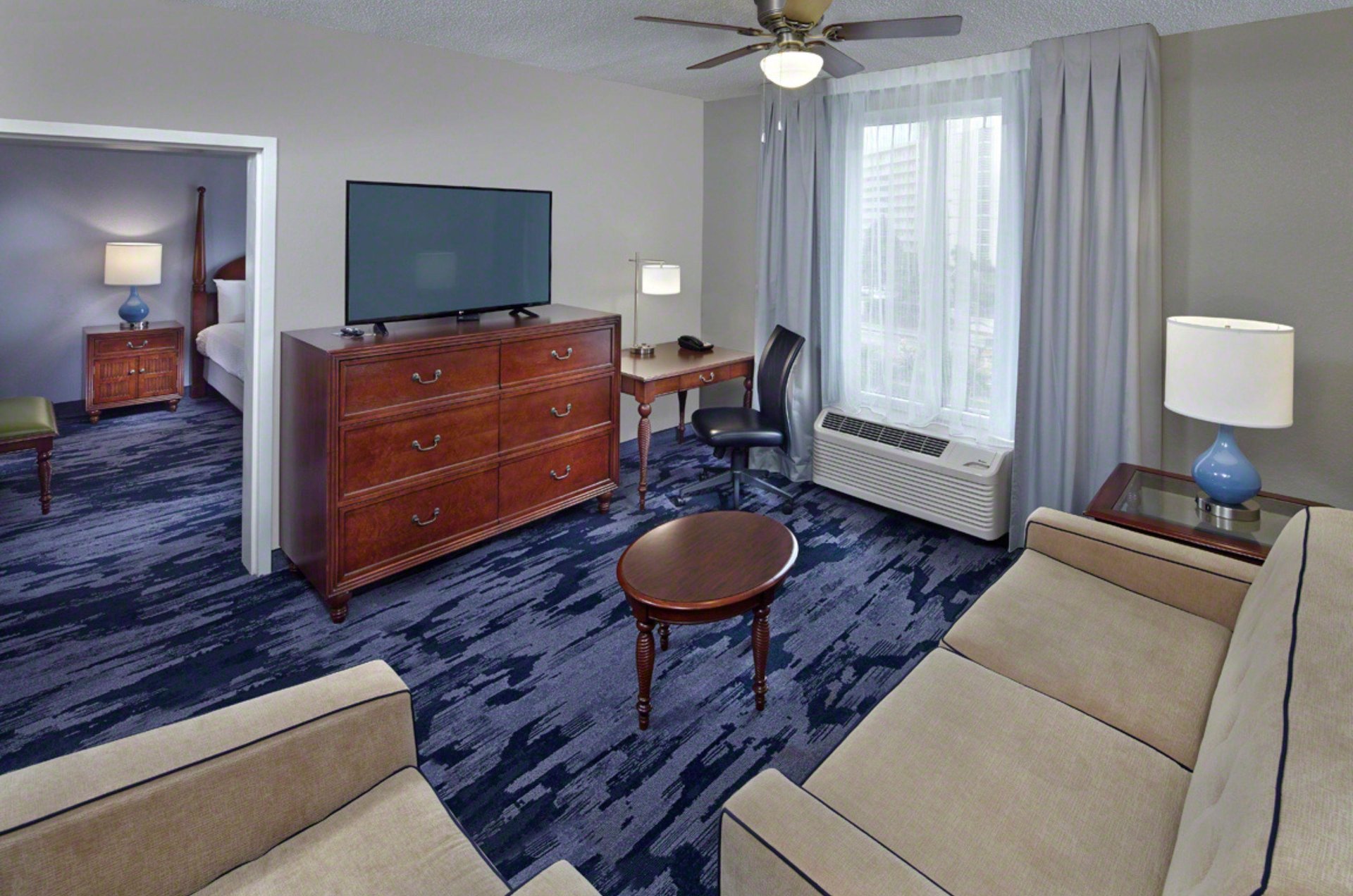 This suite has a separate living room and bedroom.