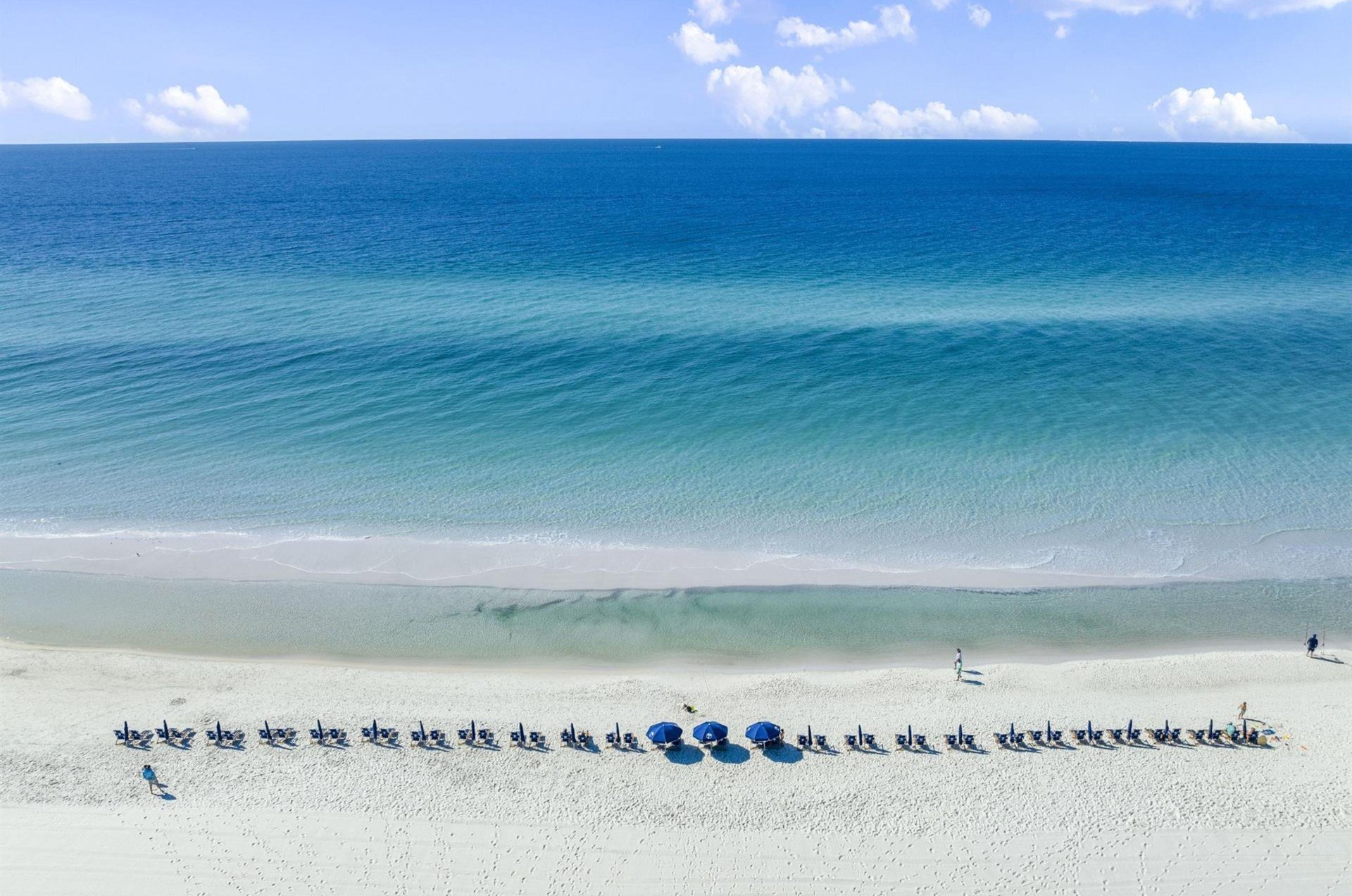 View of the Gulf and beach from a private balcony at Destin Beach Club