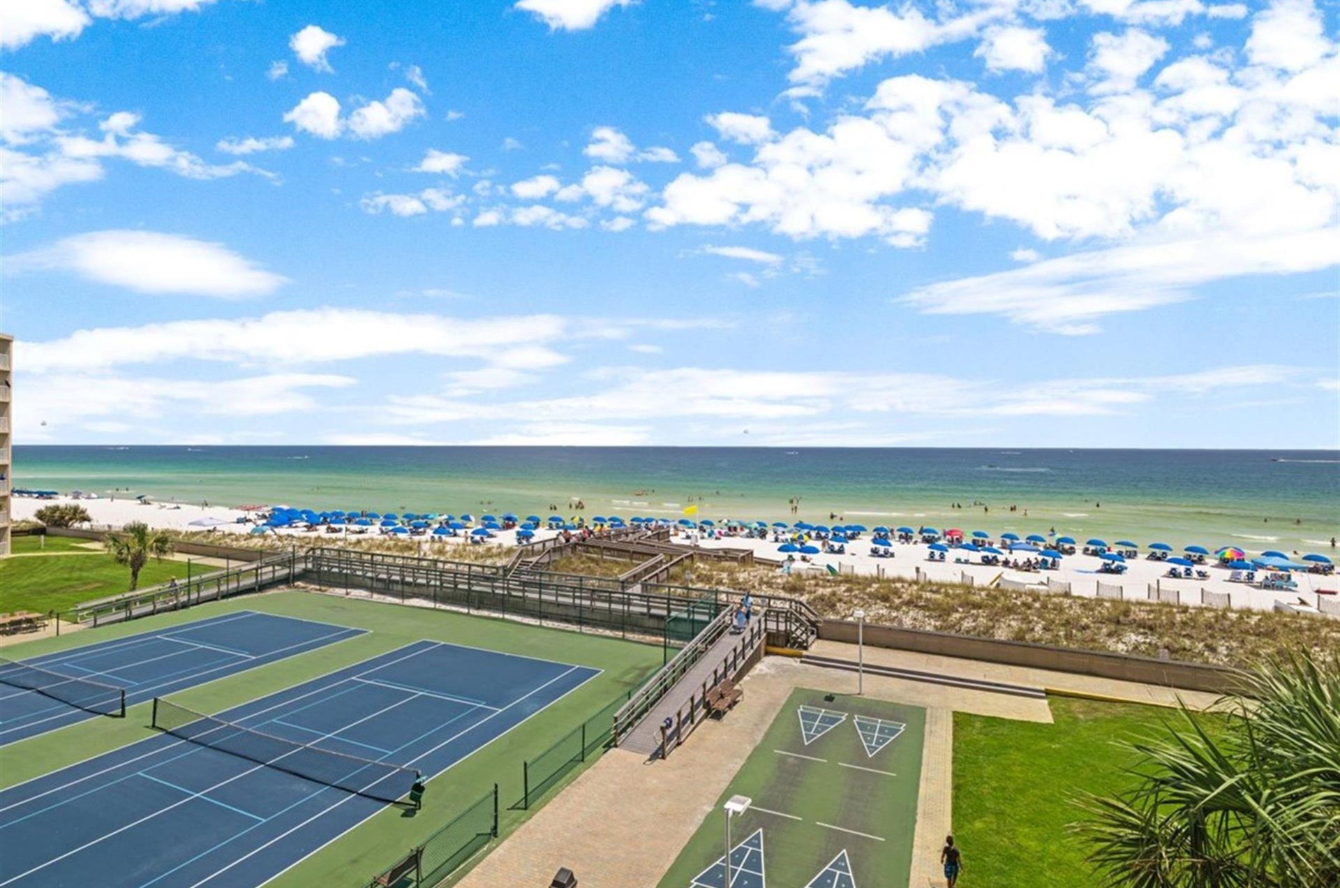 The complexs beachside tennis and shuffleboard courts.