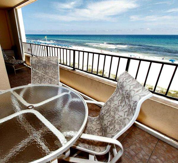 Table and chairs on a Gulffront balcony at Surf Dweller Fort Walton Beach