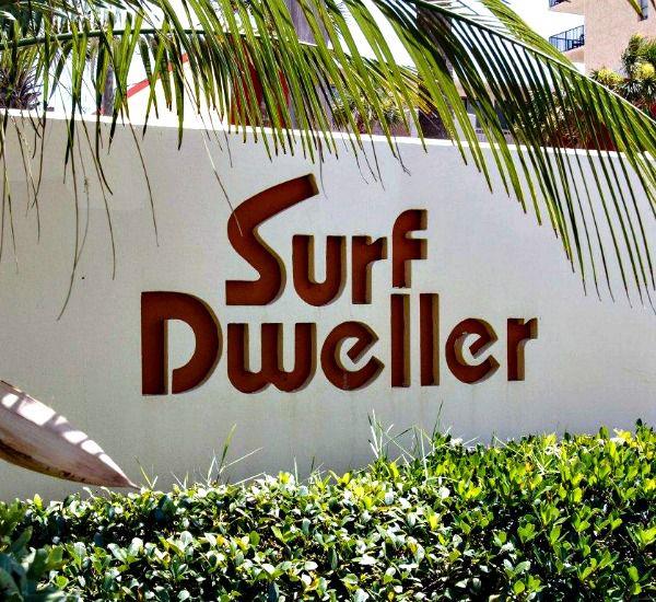 Palmshaded sign outside Surf Dweller Fort Walton Beach
