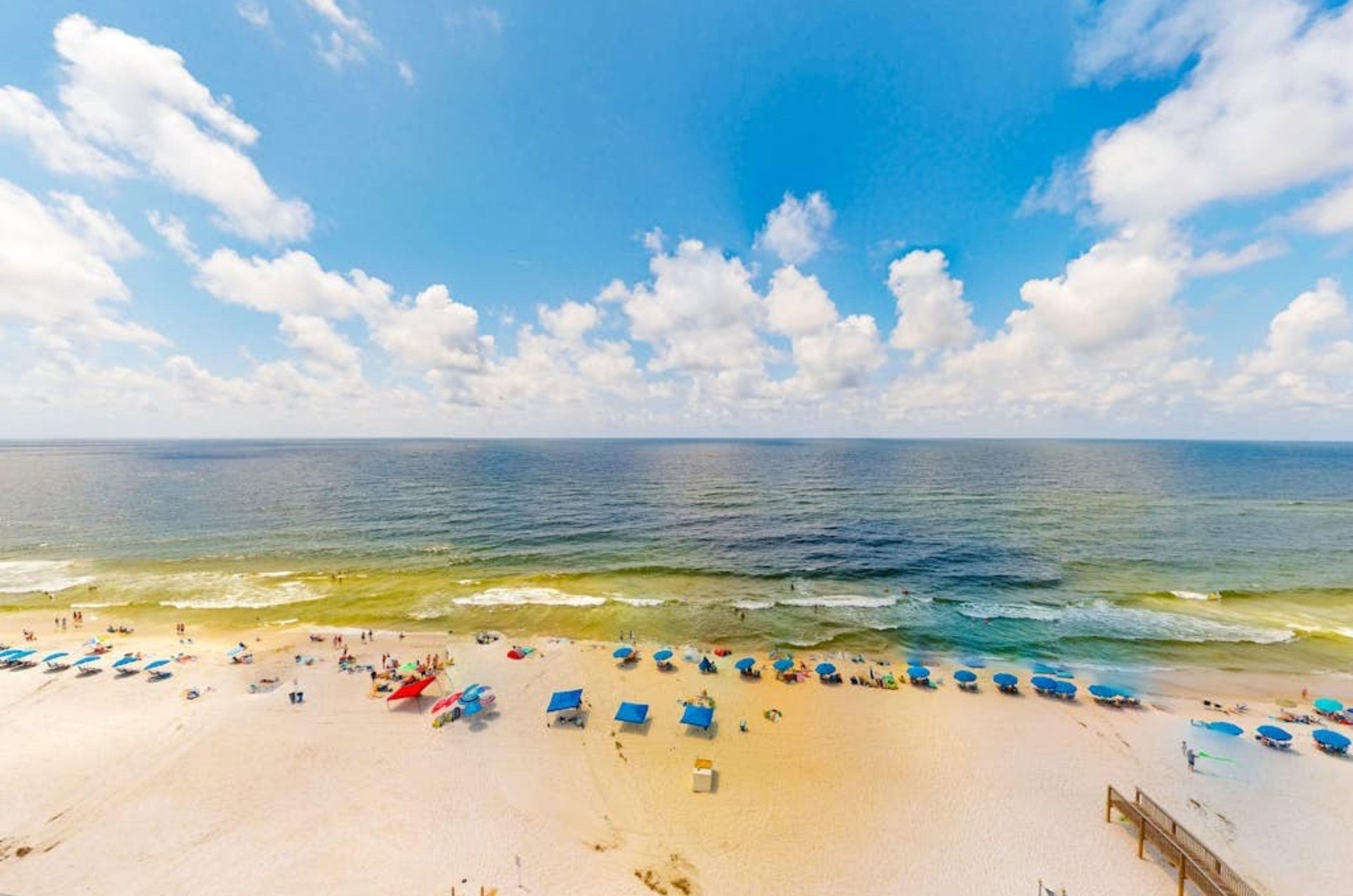 A view of the Gulf and the beach from a private balcony at Gulf Tower in Gulf Shores Alabama