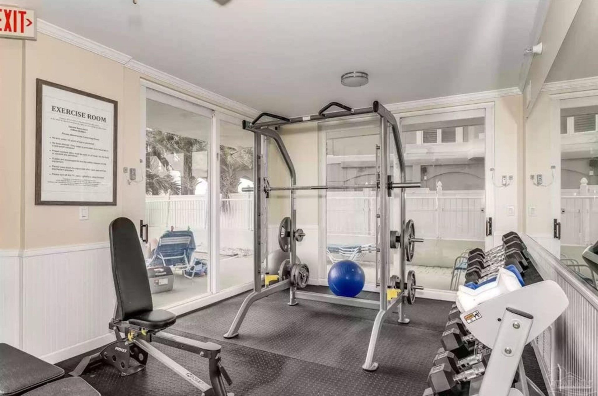 The squat rack and strength equipment in the gym at SeaSpray Condominiums