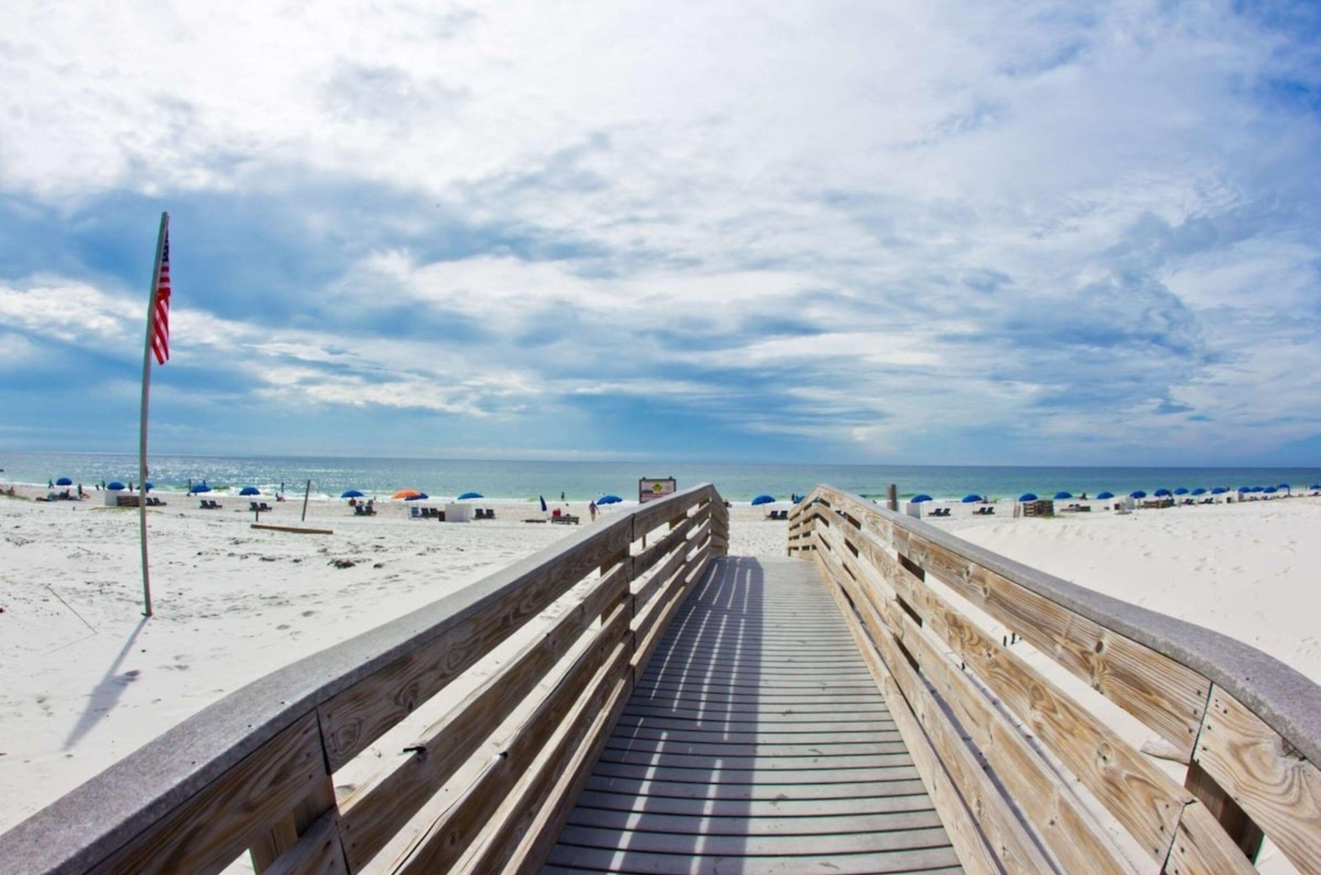 A wooden boardwalk leading to the Gulf at the Hilton Garden Inn in Orange Beach Alabama