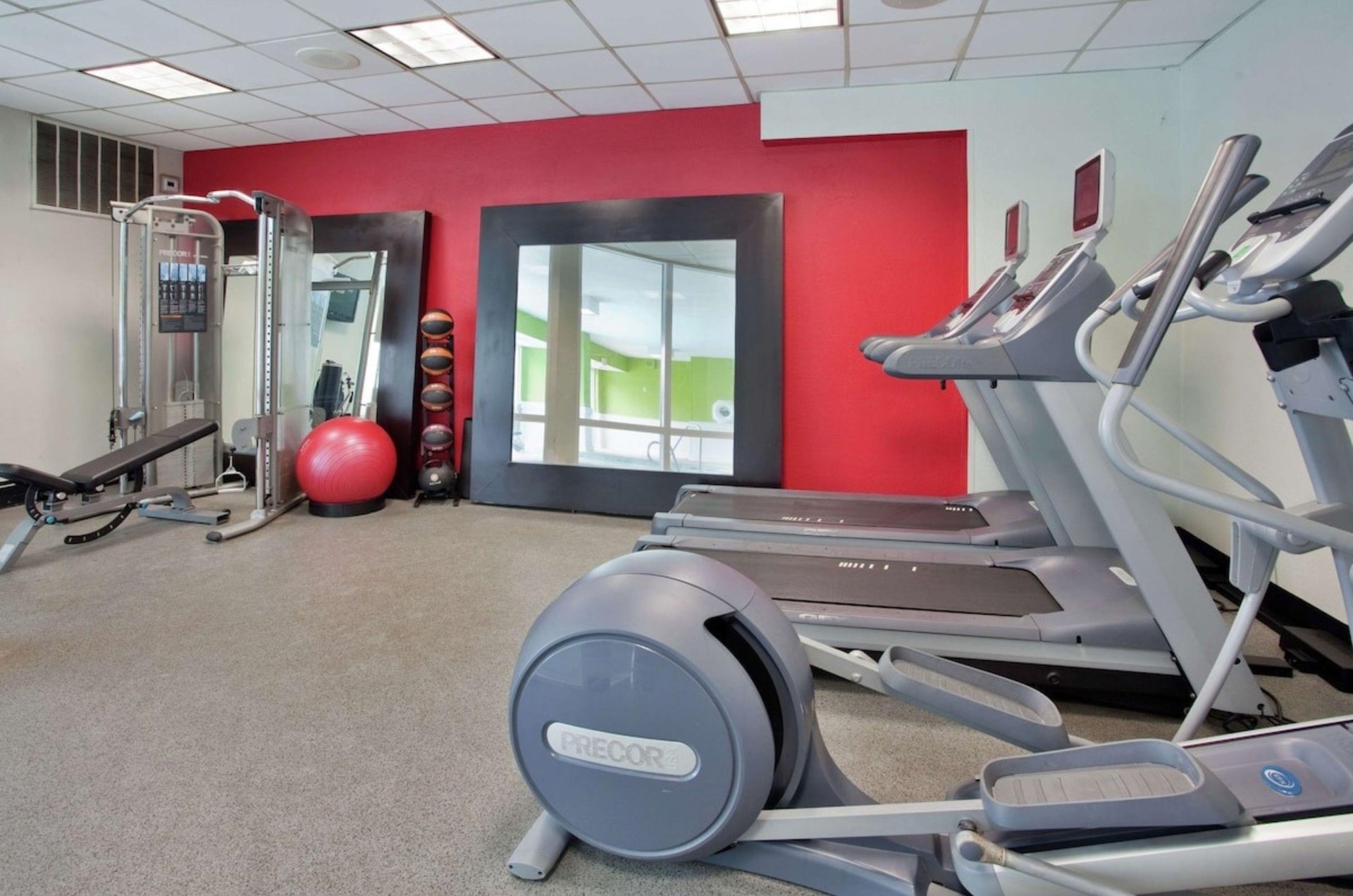 The onsite fitness center with cardio and strength equipment at Hilton Garden Inn in Orange Beach Alabama