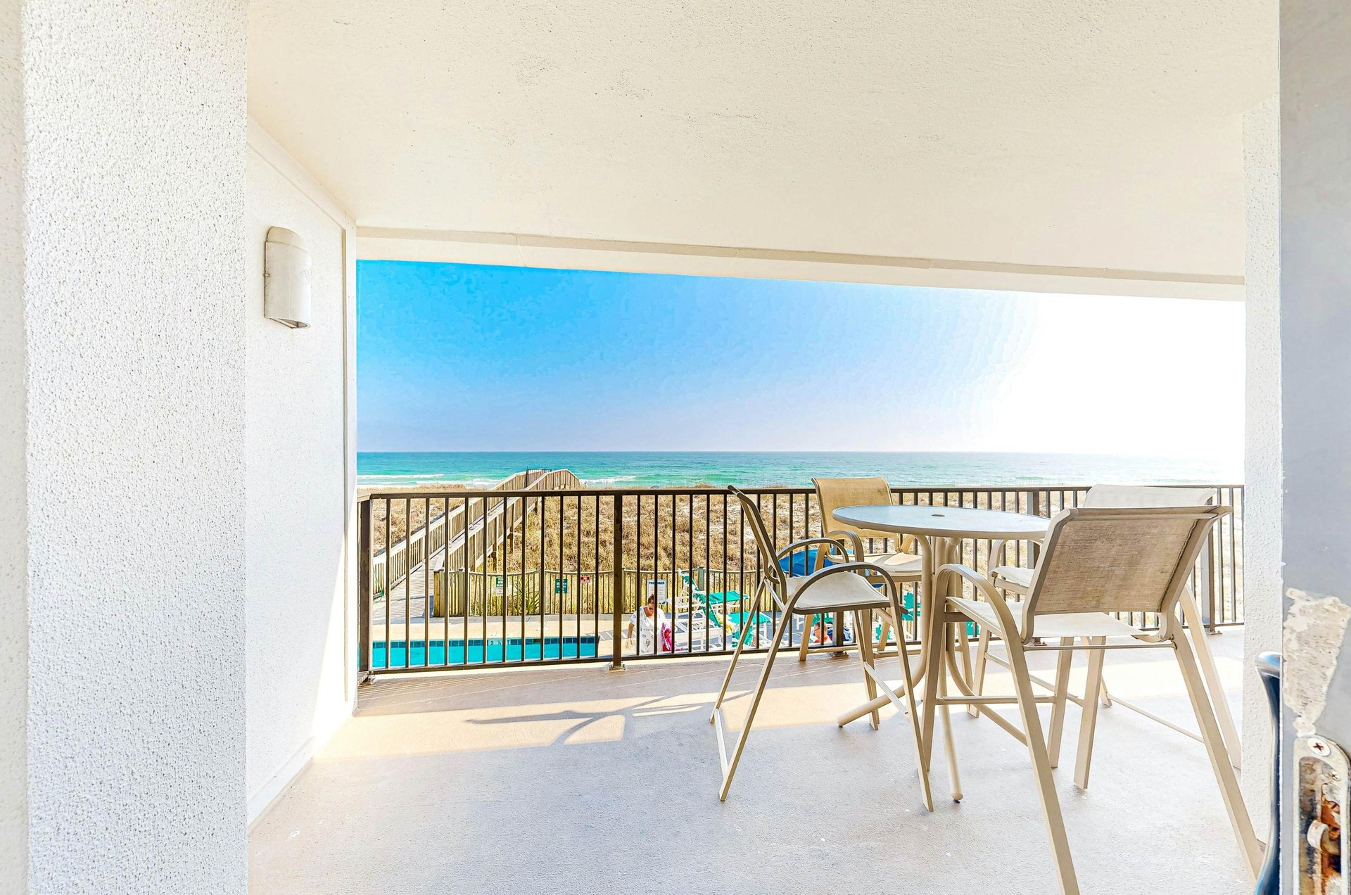 Unwind on a private balcony with stunning beach views