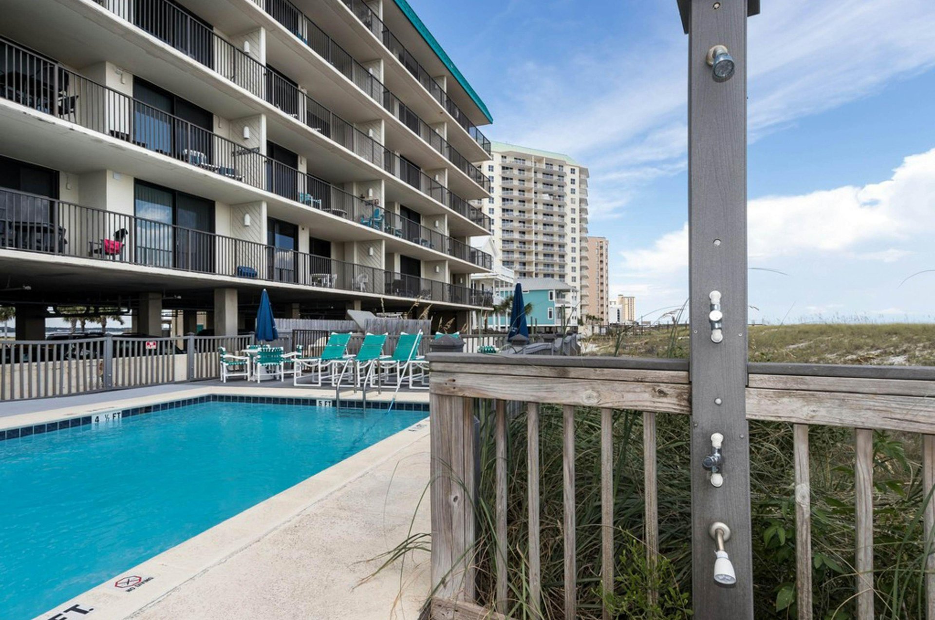 Take a dip in the beachside pool at Emerald Surf