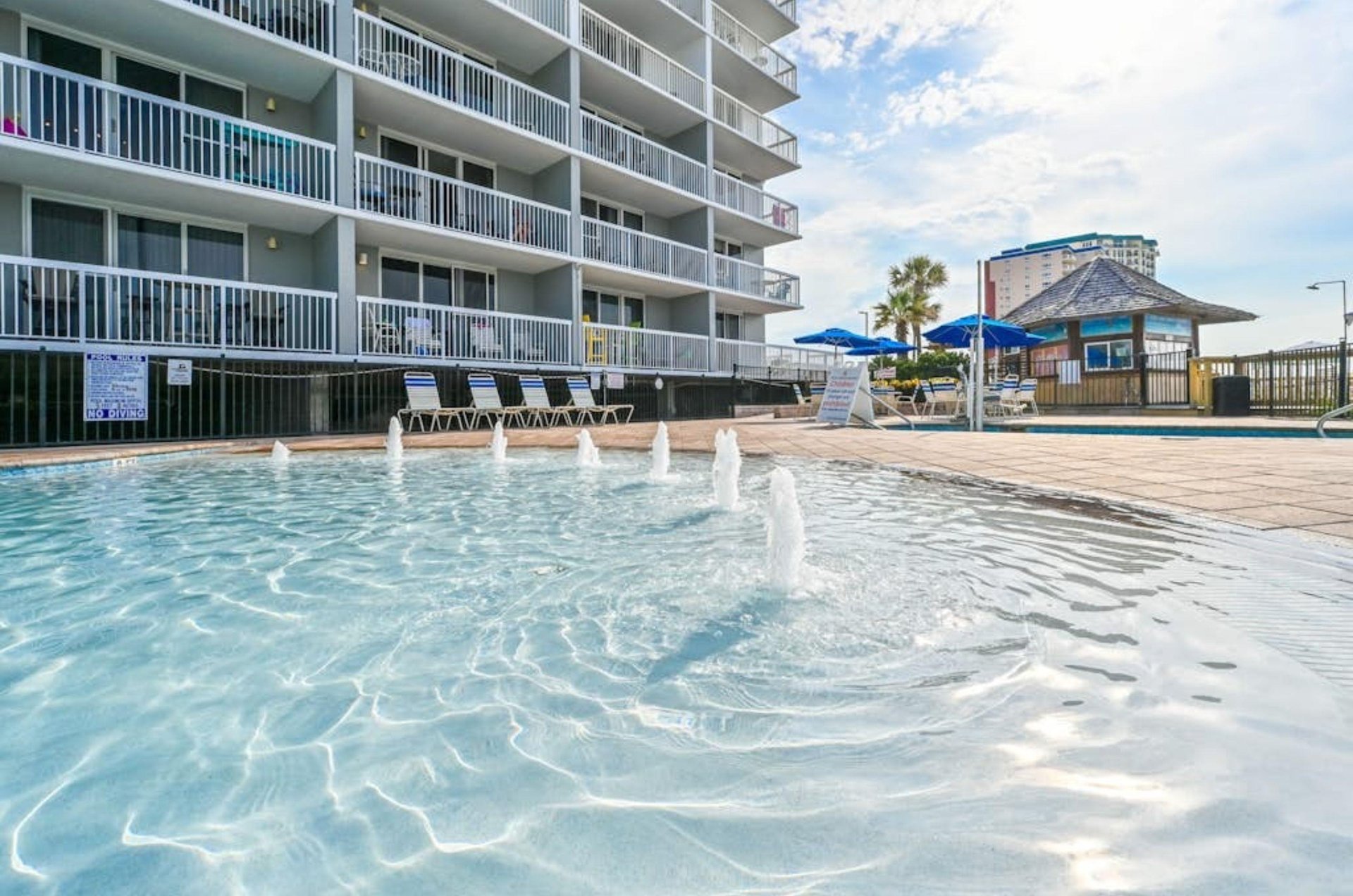The sparkling zeroentry swimming pool at Pelican Beach Resort