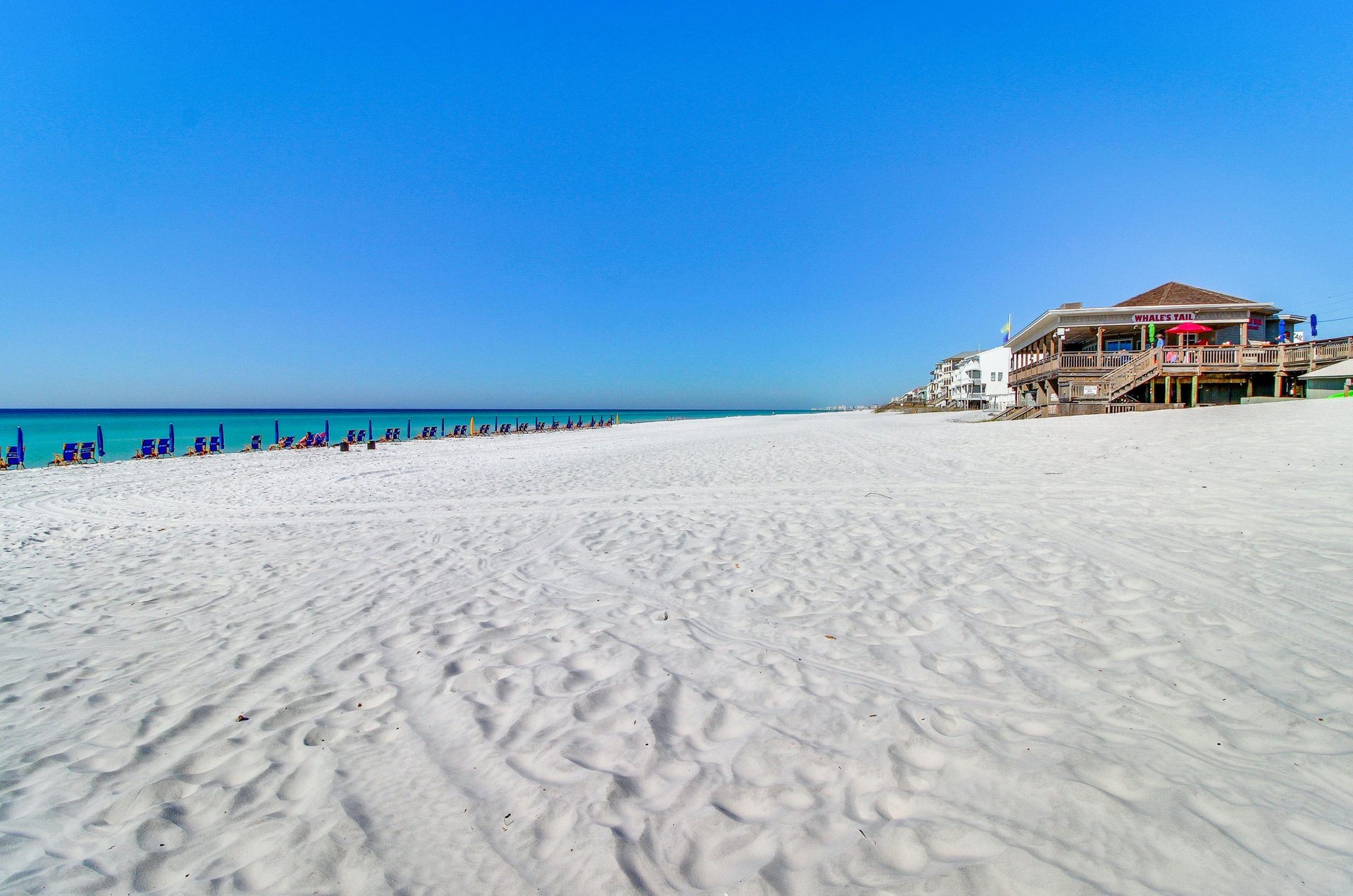 Chairs and umbrellas poised for Seascape Villas guests