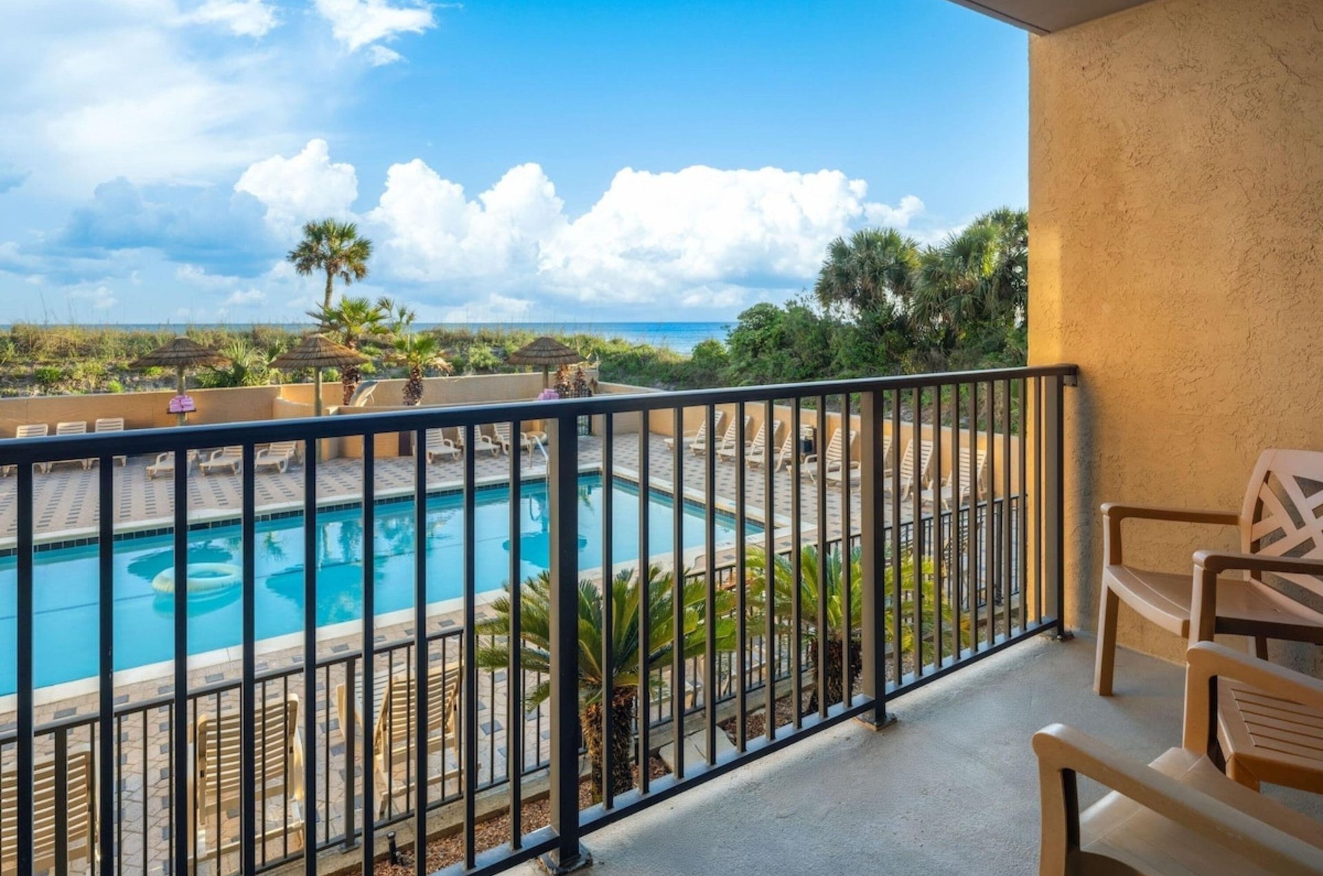 Rooms include a private balcony with water views