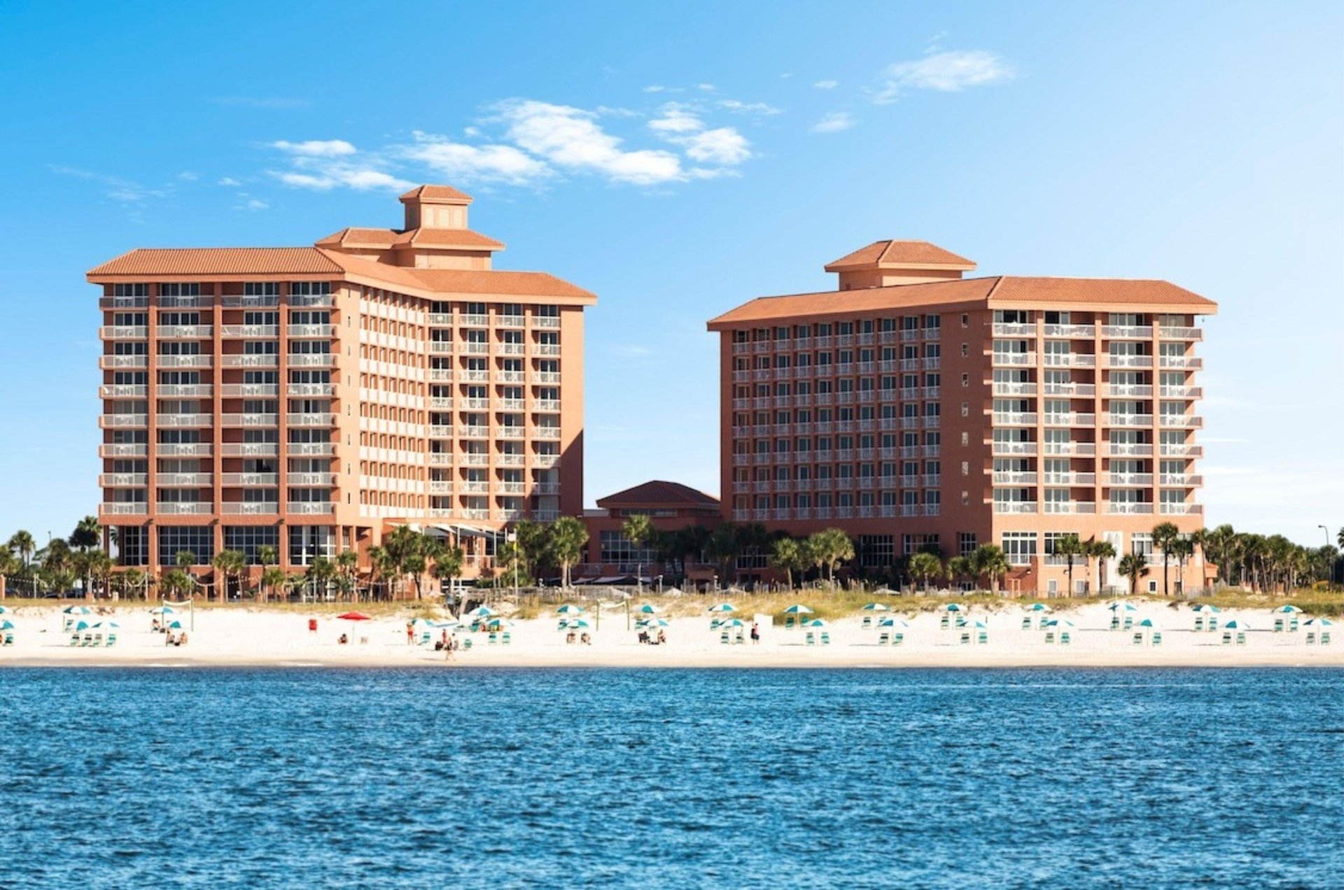 View of the beach and the exterior of Perdido Beach Resort in Orange Beach Alabama