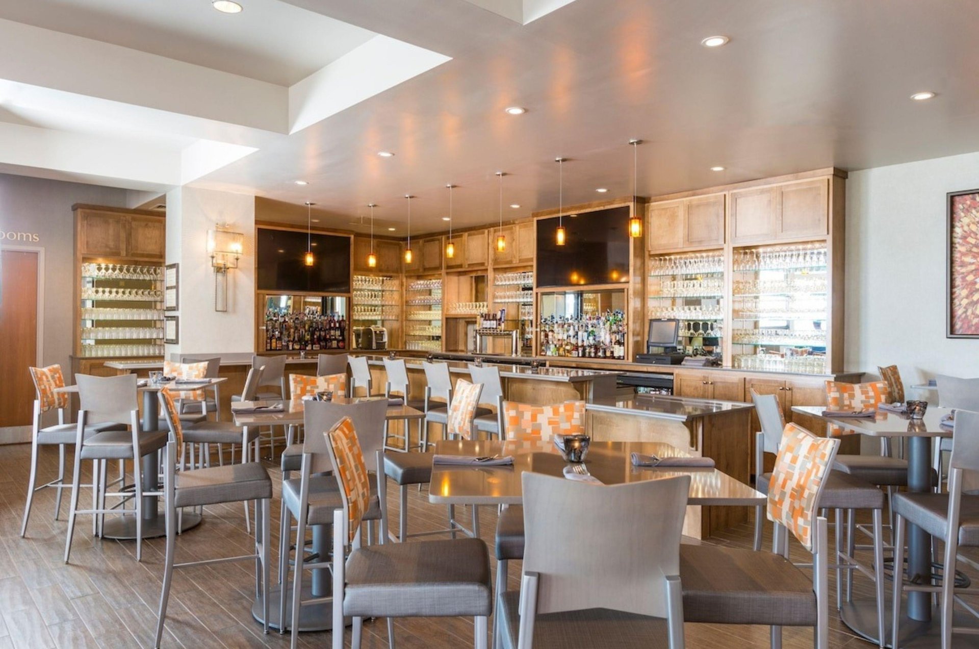 A bar and a dining room in one of the restaurants at Perdido Beach Resort in Orange Beach Alabama