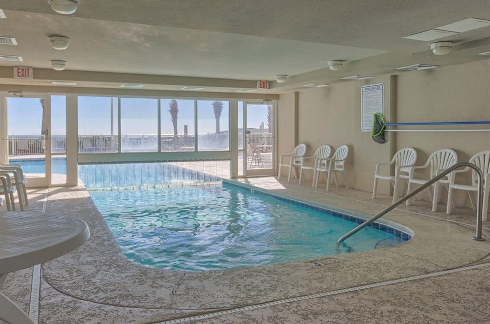 The indoor section of the indooroutdoor pool at Tradewinds Condominiums in Orange Beach Alabama