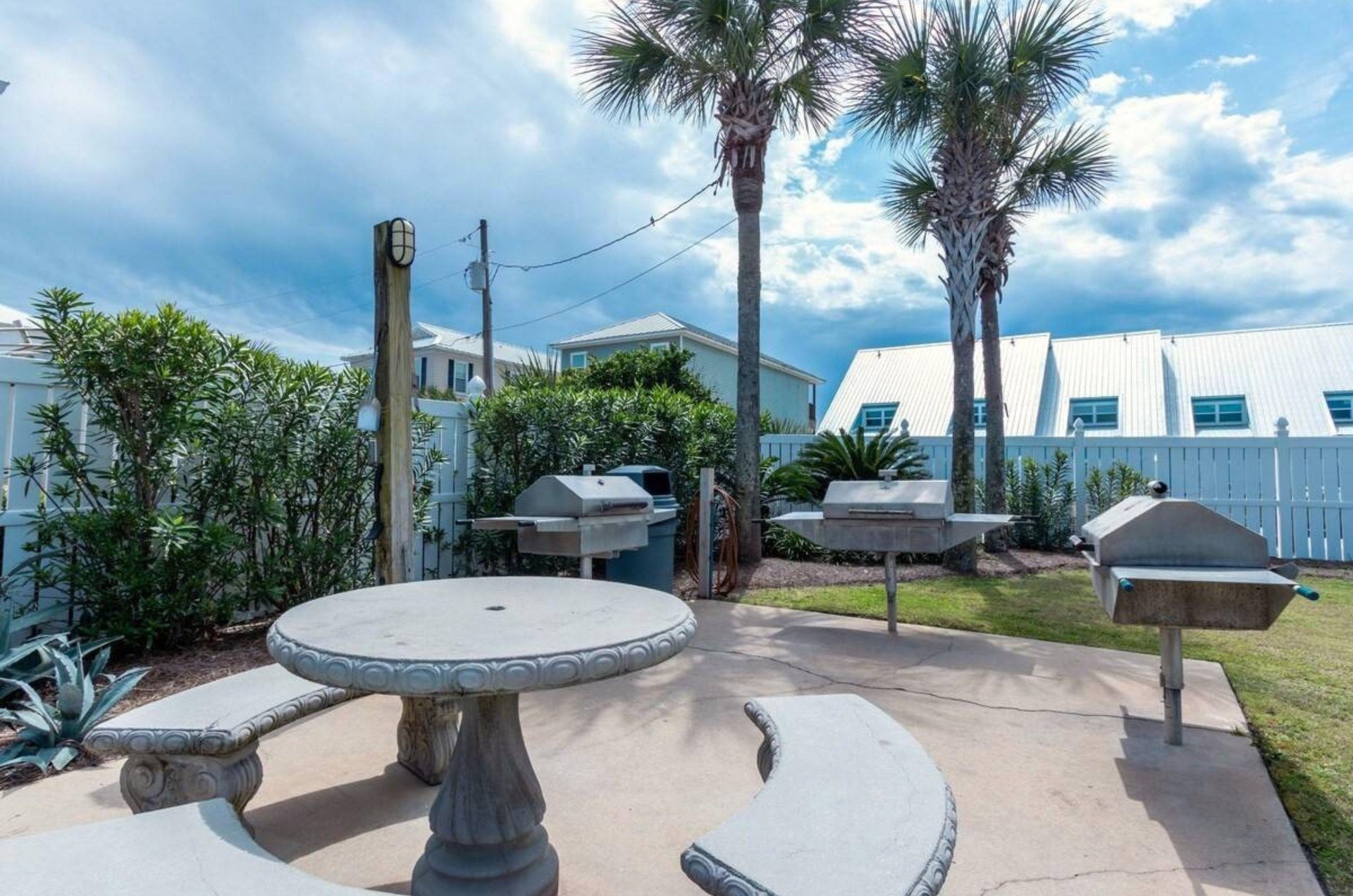 Outdoor grills and picnic tables at Tradewinds in Orange Beach Alabama