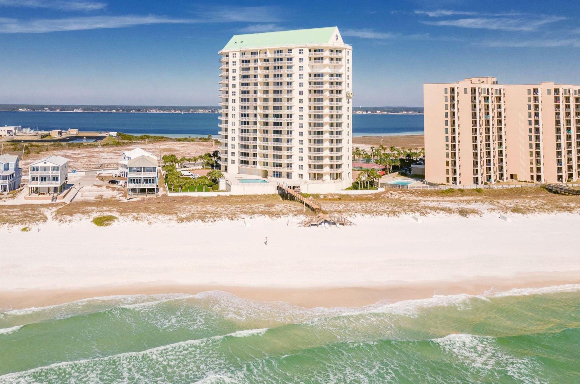 Beachfront facade of Bell Mer Condominiums in Navarre Beach Florida