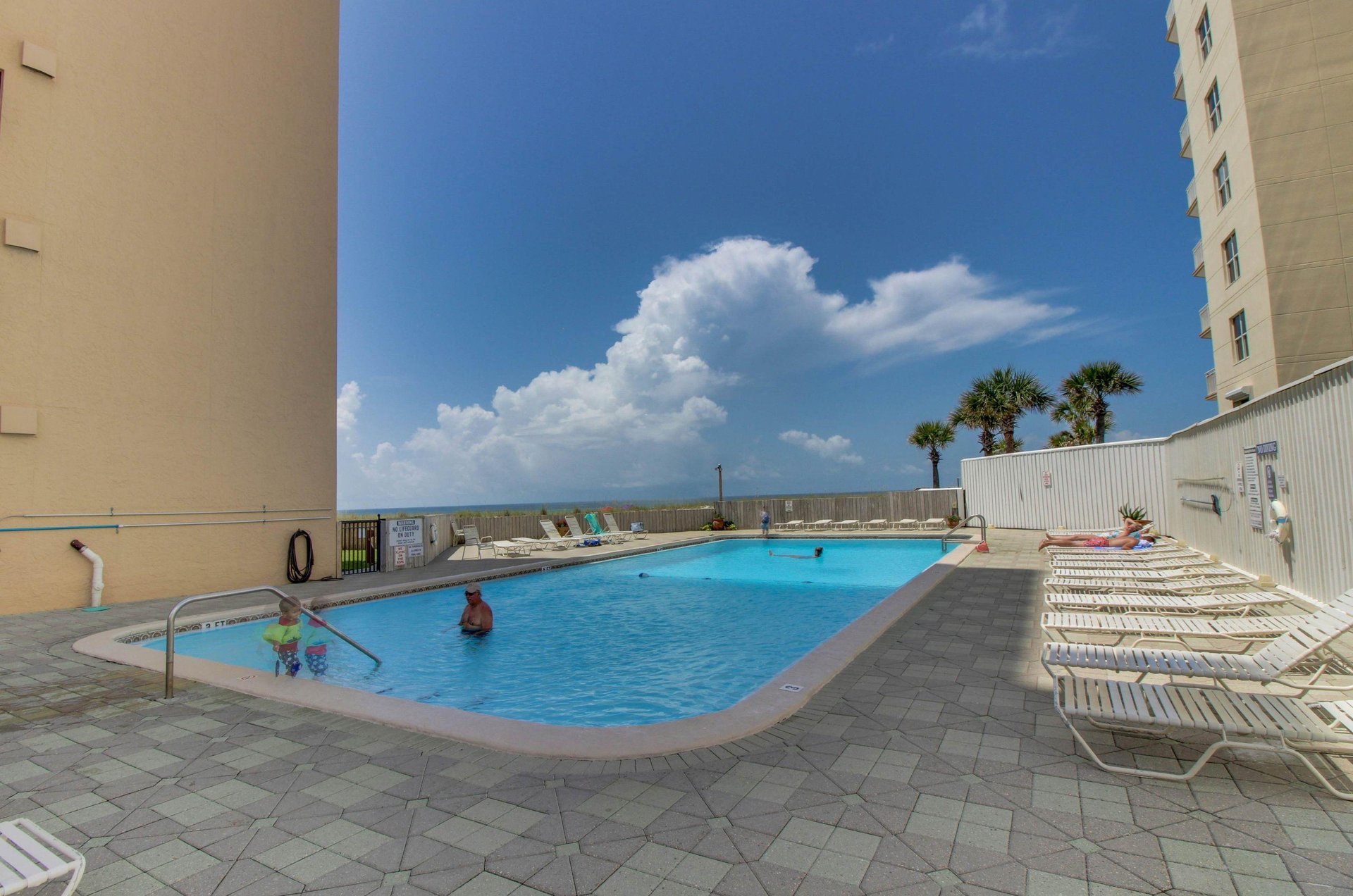 Unwind by the pool only steps away from the coast