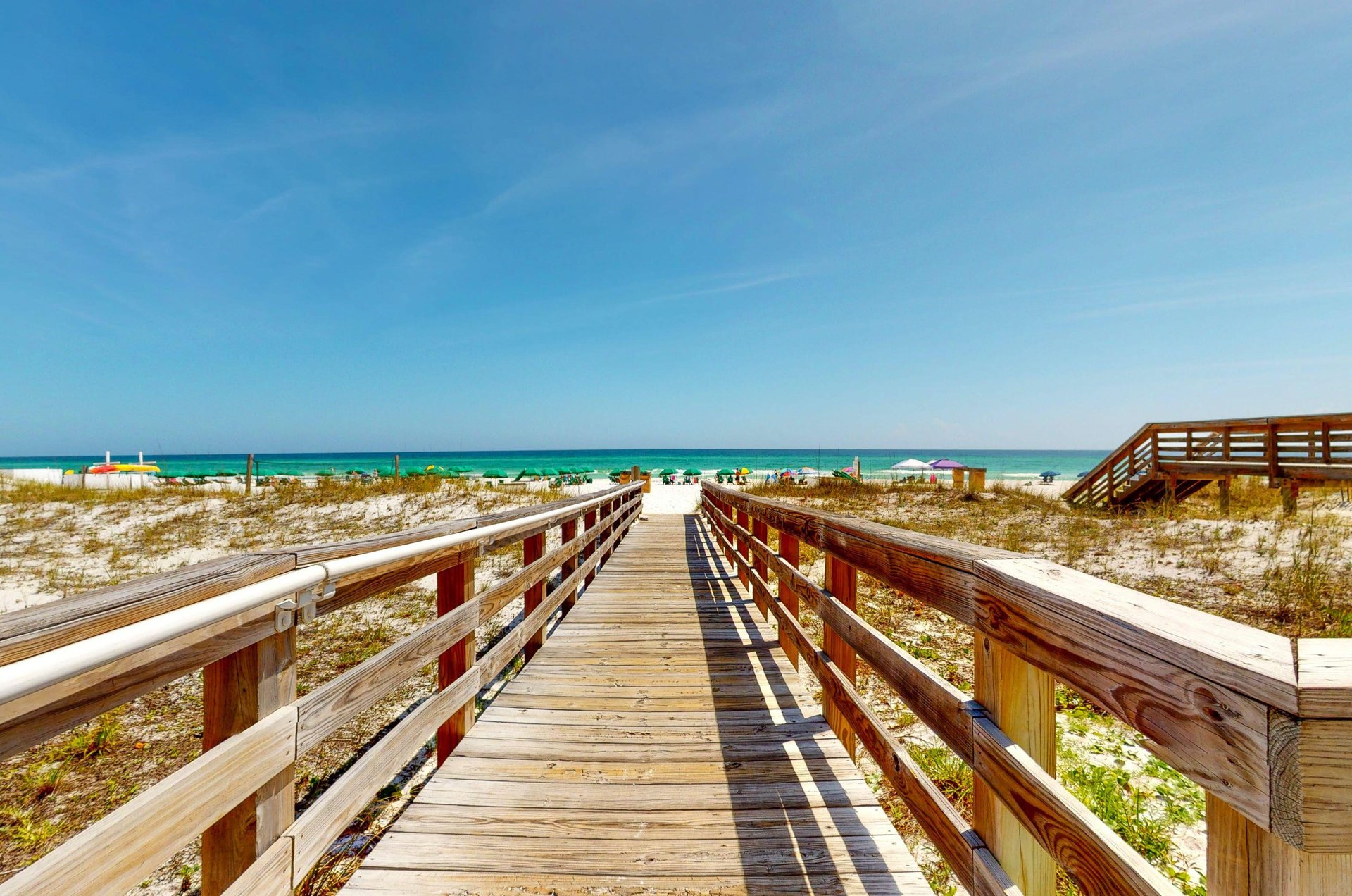 Boardwalk from the property to the beach